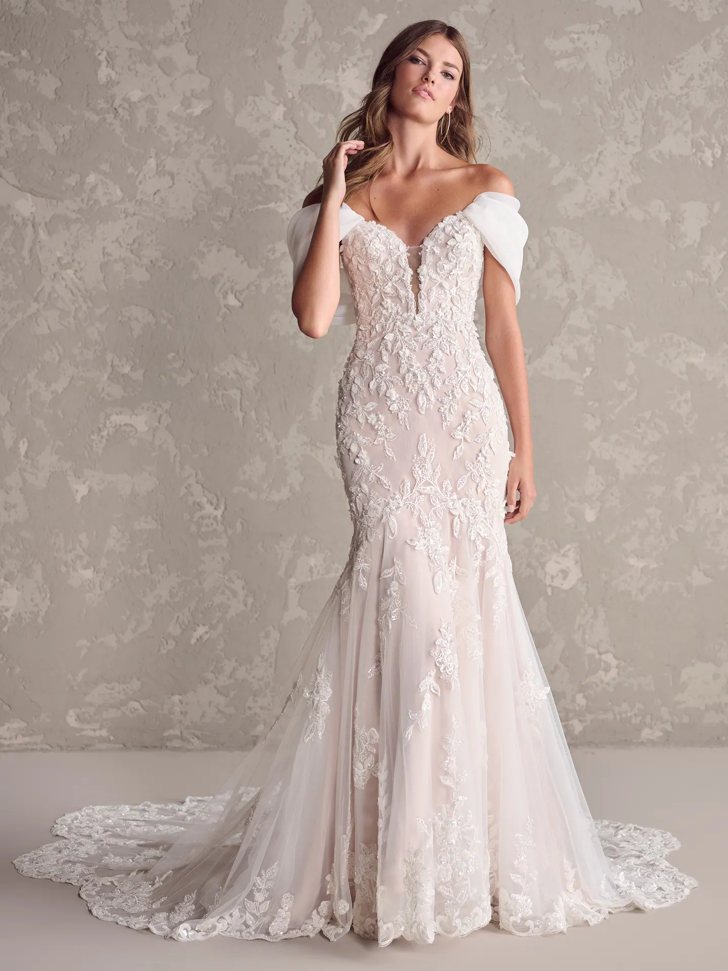 Sottero and Midgley Tanica front view, plunging sweetheart neckline gown with lace details.
