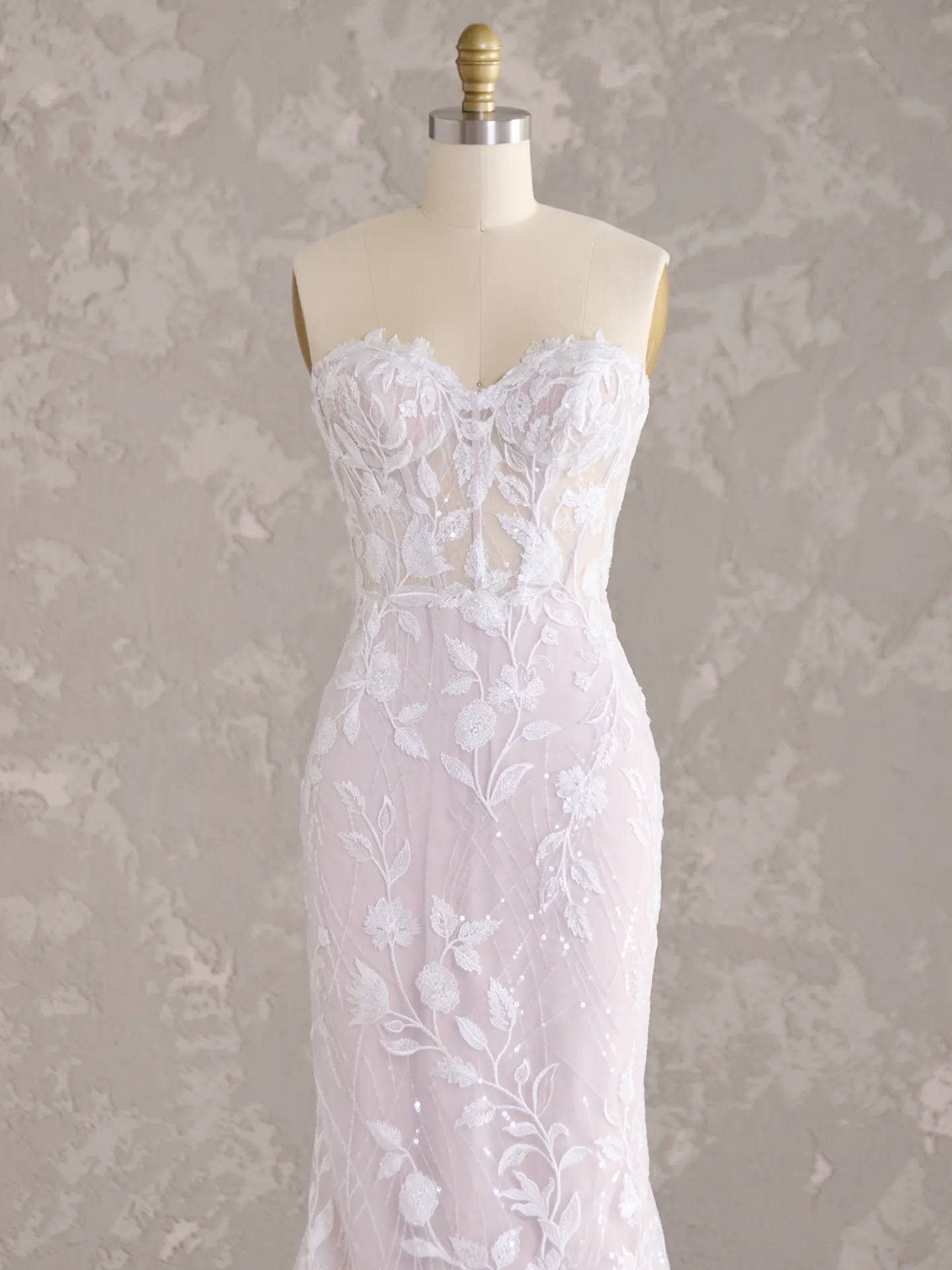 Maggie Sottero Fairchild front view lace bridal gown on mannequin