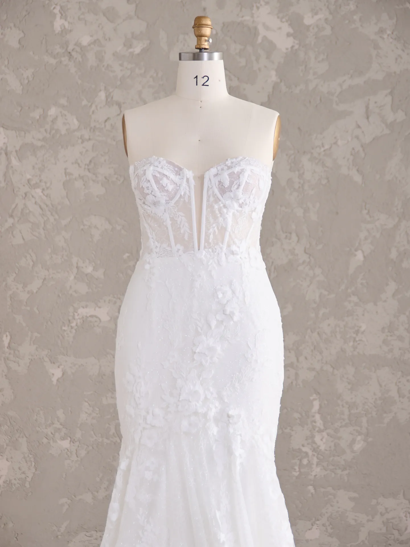 Ortensia lace bridal dress on mannequin front view Maggie Sottero