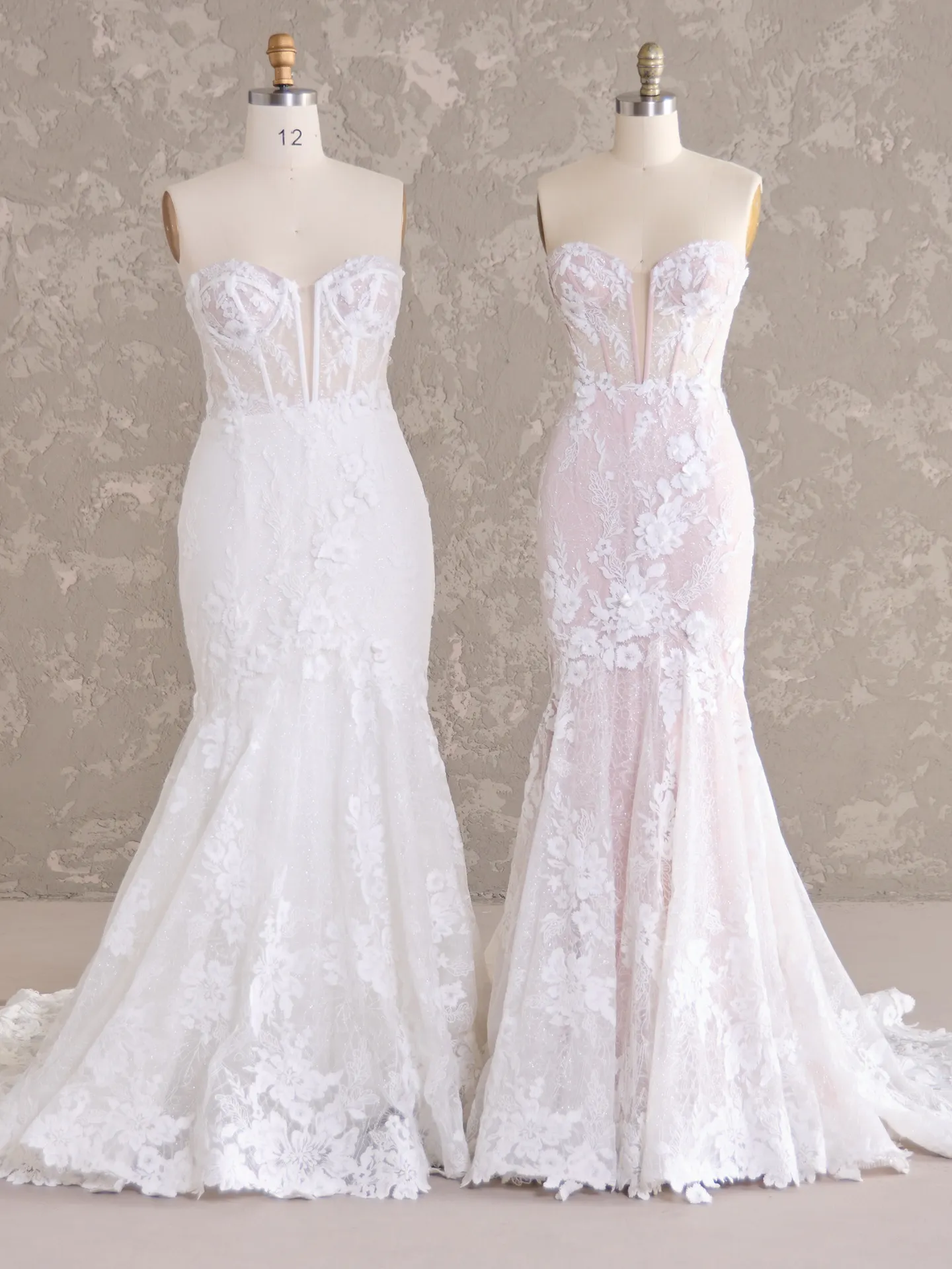 Ortensia glamorous lace bridal dress on mannequins, front view. Maggie Sottero.