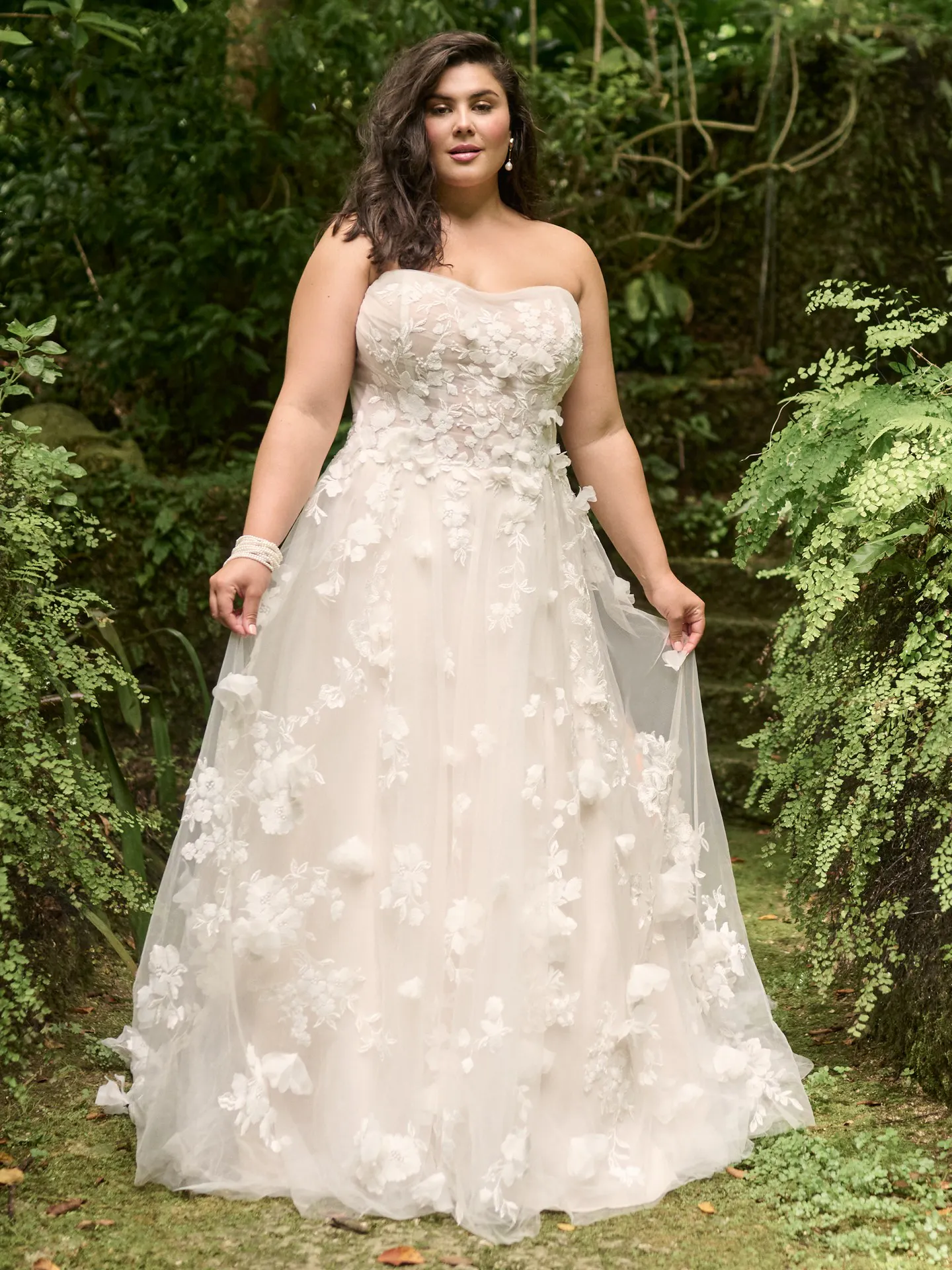 Maggie Sottero Laila floral gown front view in garden setting