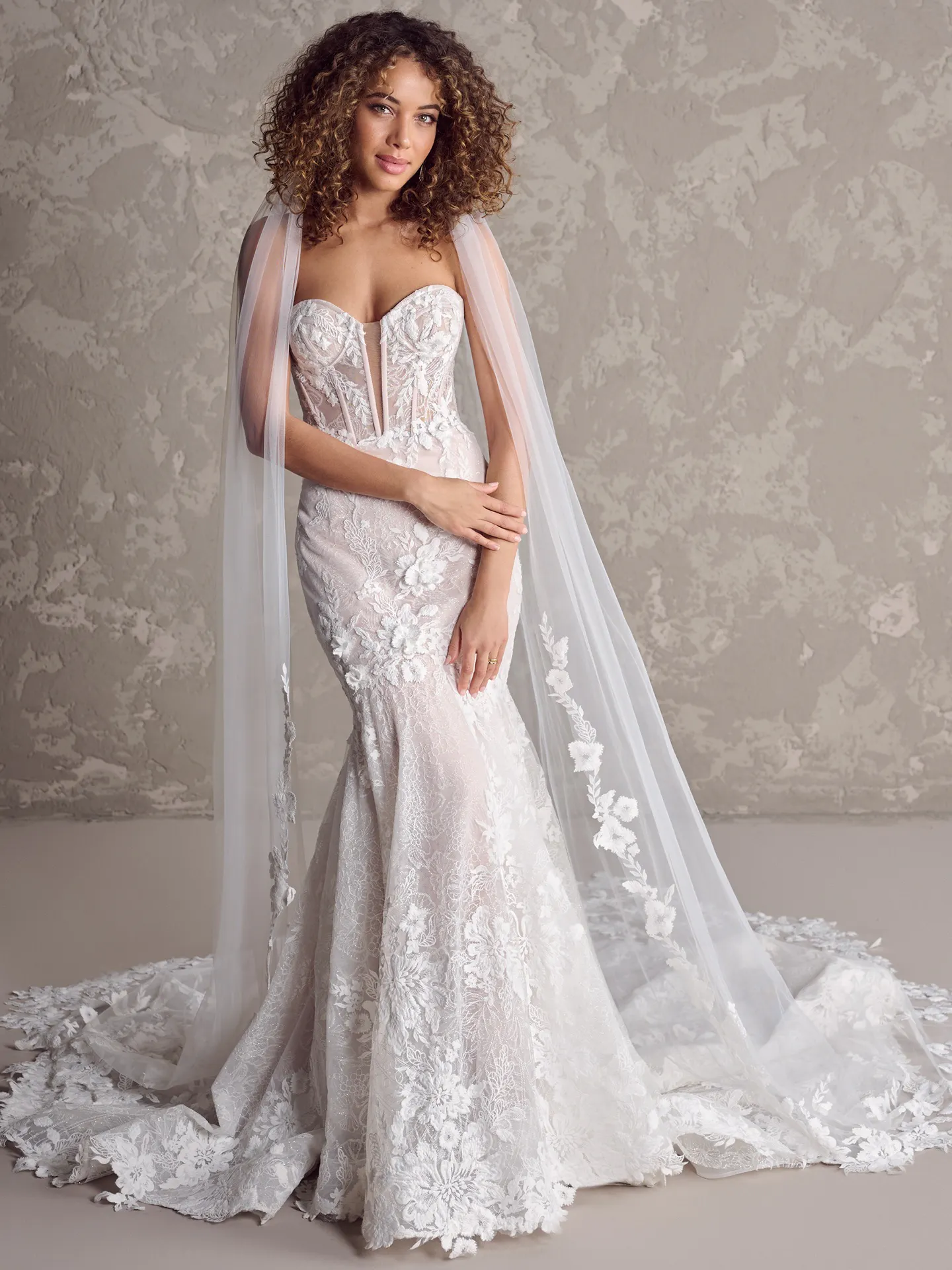Maggie Sottero wedding dress front view with cathedral-length veil