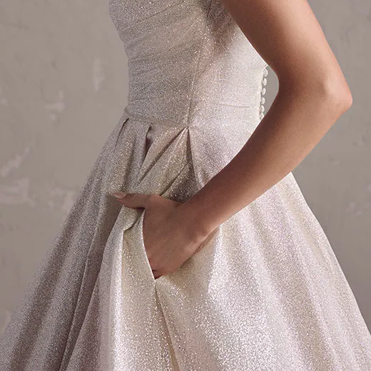 Anniston Leigh side view, glitter tulle with pocket detail, modest ballgown style