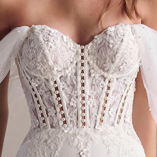 Maggie Sottero Doritte front view lace and pearl detail