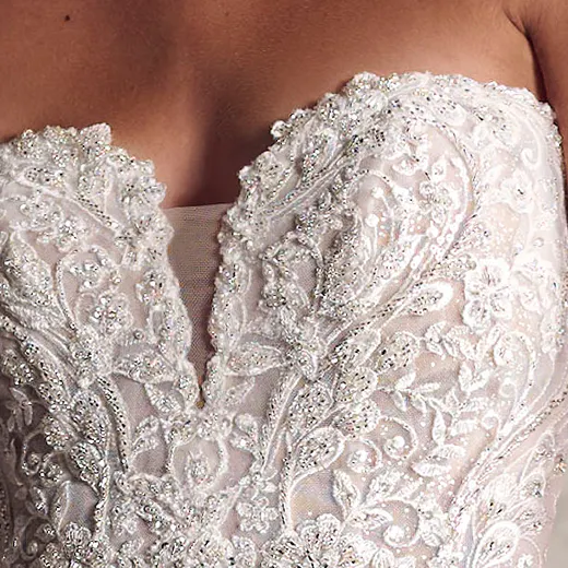 Maggie Sottero Marguerite gown, detailed lace bodice close-up.