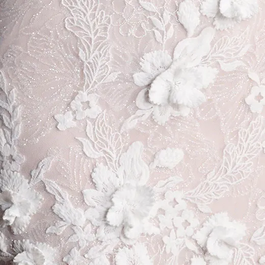 Ortensia glamorous lace detail on Maggie Sottero bridal dress