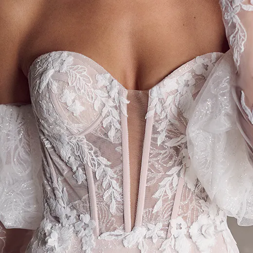 Ortensia lace bridal dress front view with floral detailing by Maggie Sottero.