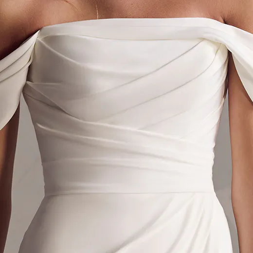 Maggie Sottero Summer front view, off-shoulder ruched crepe bodice.