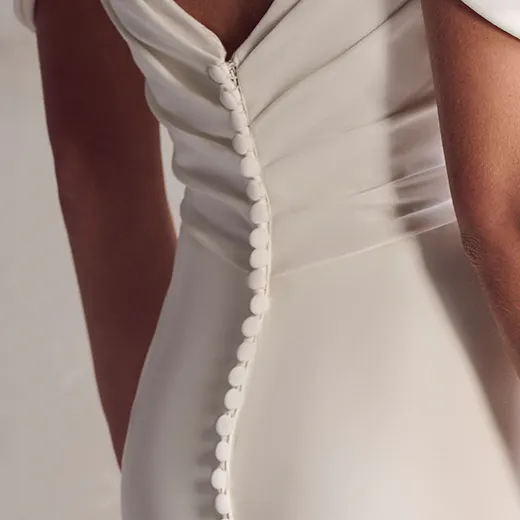 Maggie Sottero Summer back view crepe dress with button detail