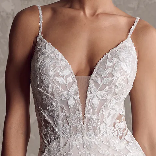 Maggie Sottero Sydney front view lace wedding dress with hip dips.