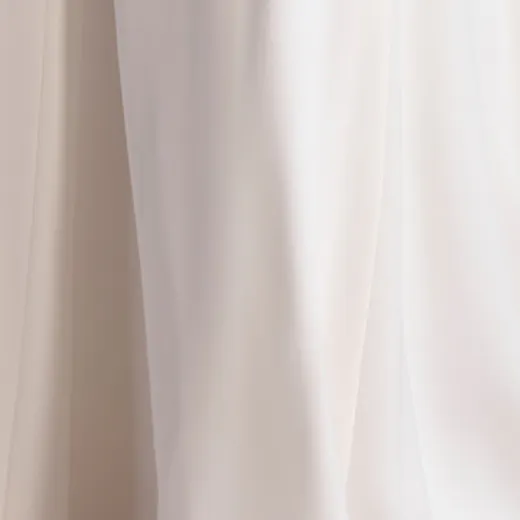 Rebecca Ingram Colby close up of satin and lace fabric.