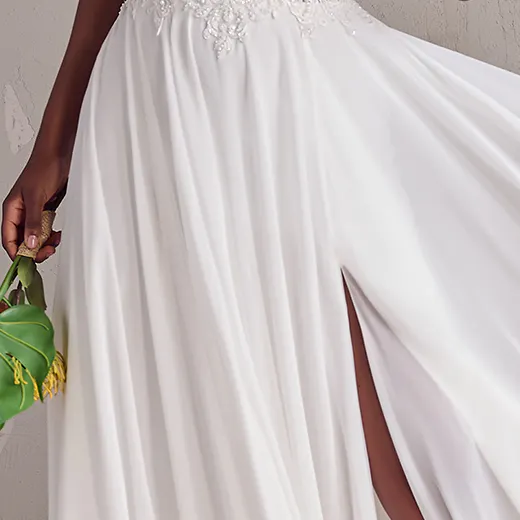 Rebecca Ingram Poppy chiffon wedding dress with slit detailing.