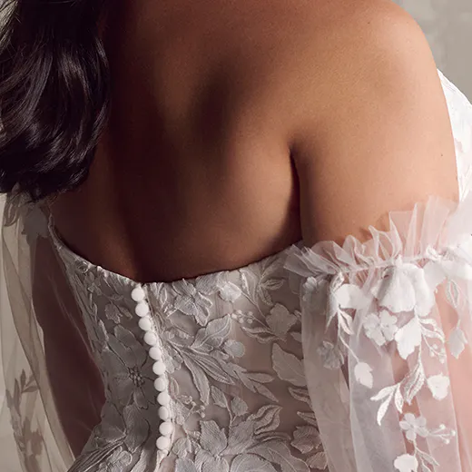 Rebecca Ingram Ruby back view, lace floral detail, sheer sleeves