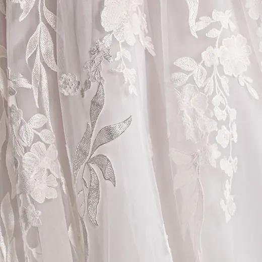 Sottero and Midgley Destin floral-detailed fabric close-up.