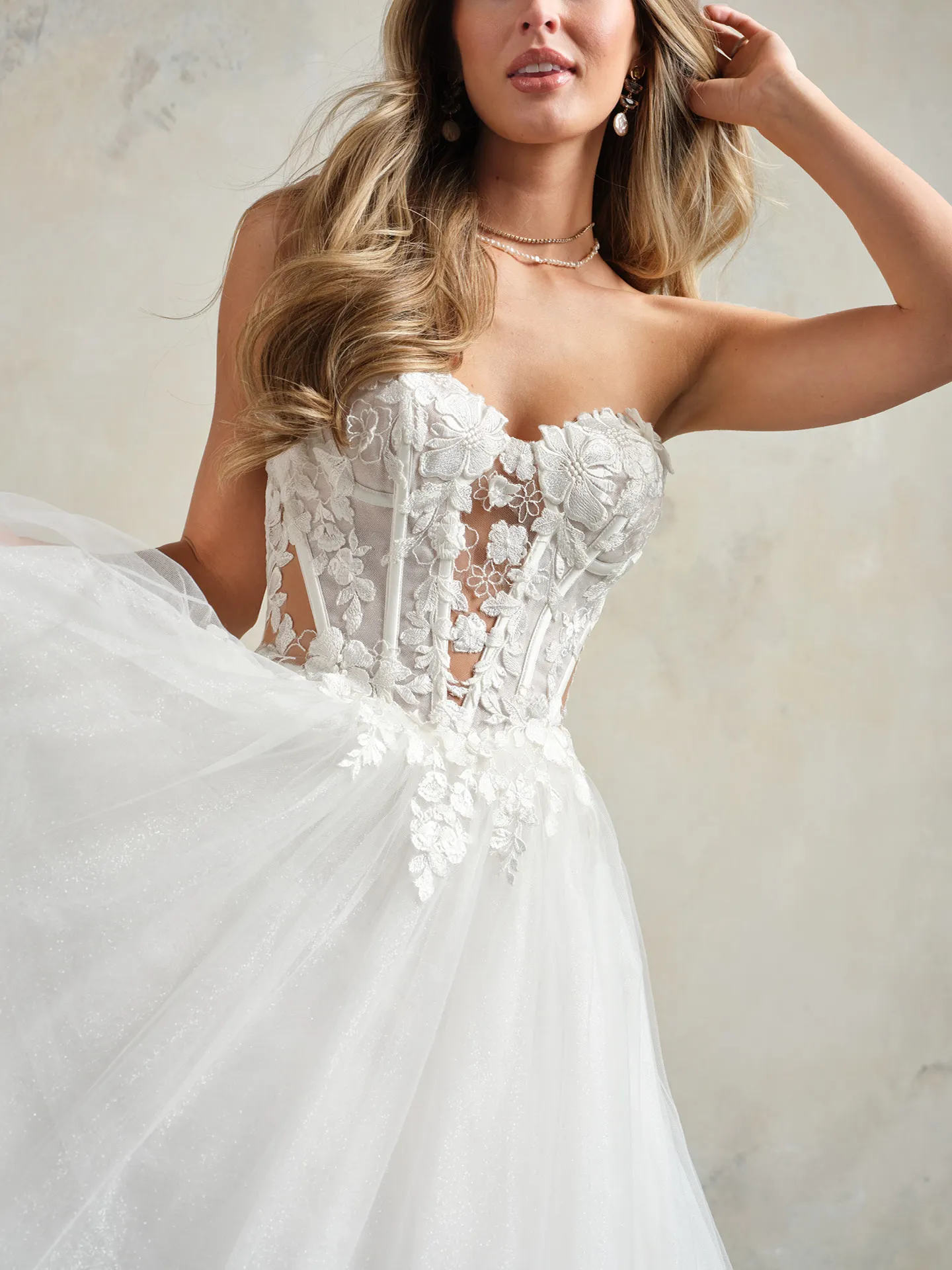 Rebecca Ingram Angelette front view unembellished floral off-the-shoulder gown