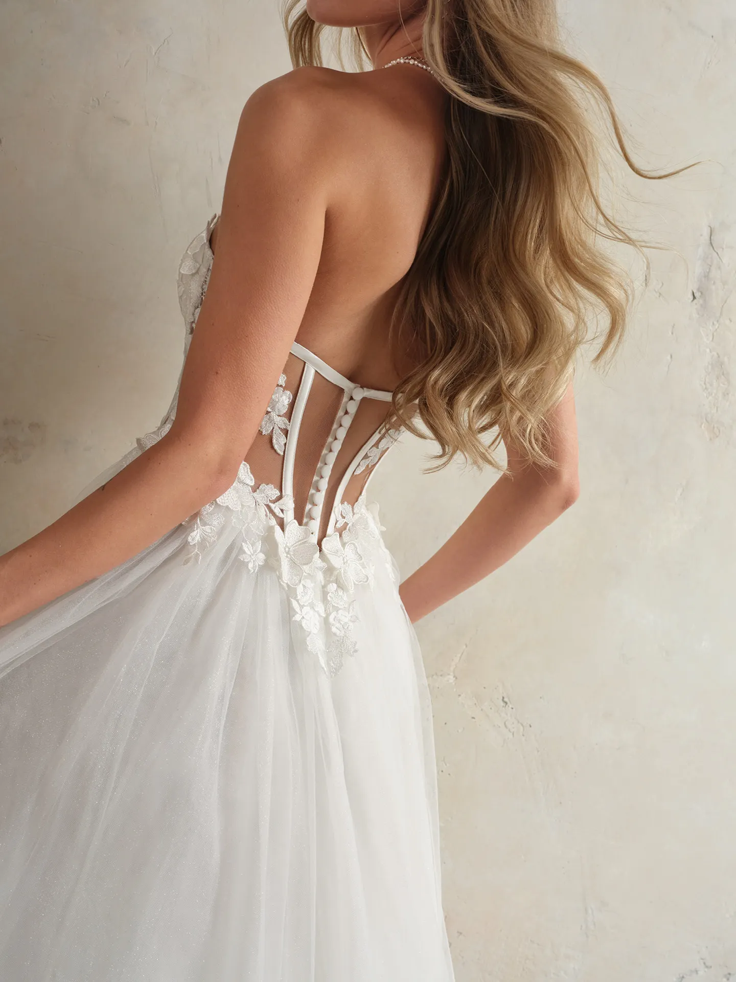 Maggie Sottero Angelette back view lace princess wedding dress