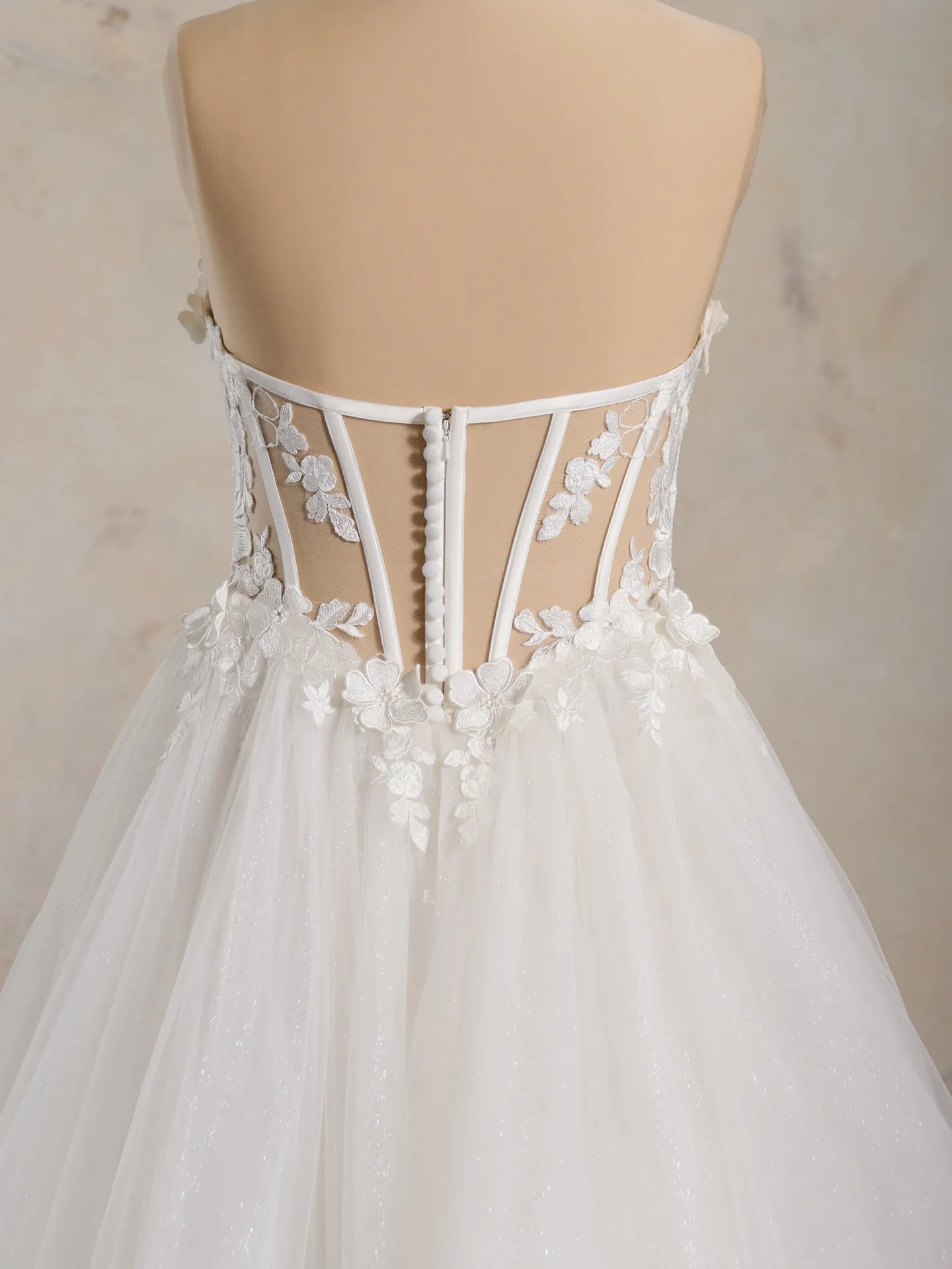 Angelette back view lace detailed wedding dress by Maggie Sottero.