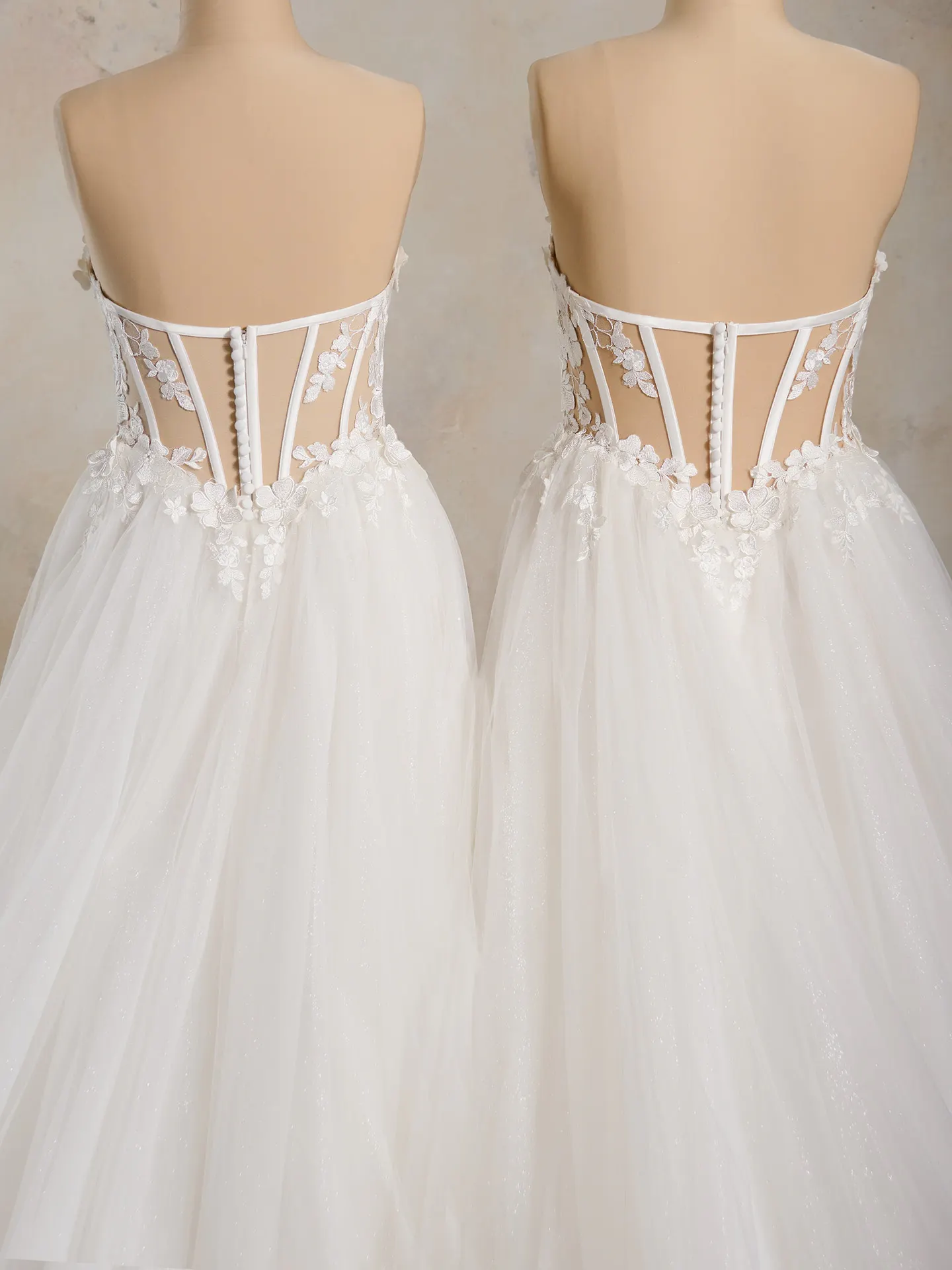 Angelette back view lace strapless wedding dress with flowing tulle skirt.
