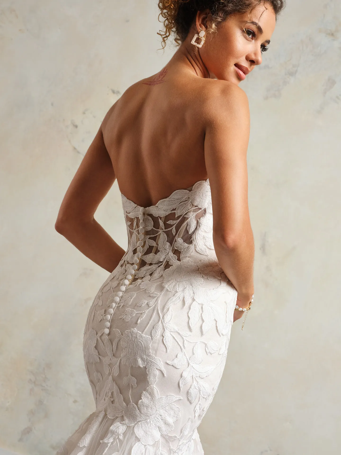 Bridget floral lace back view Maggie Sottero wedding dress.
