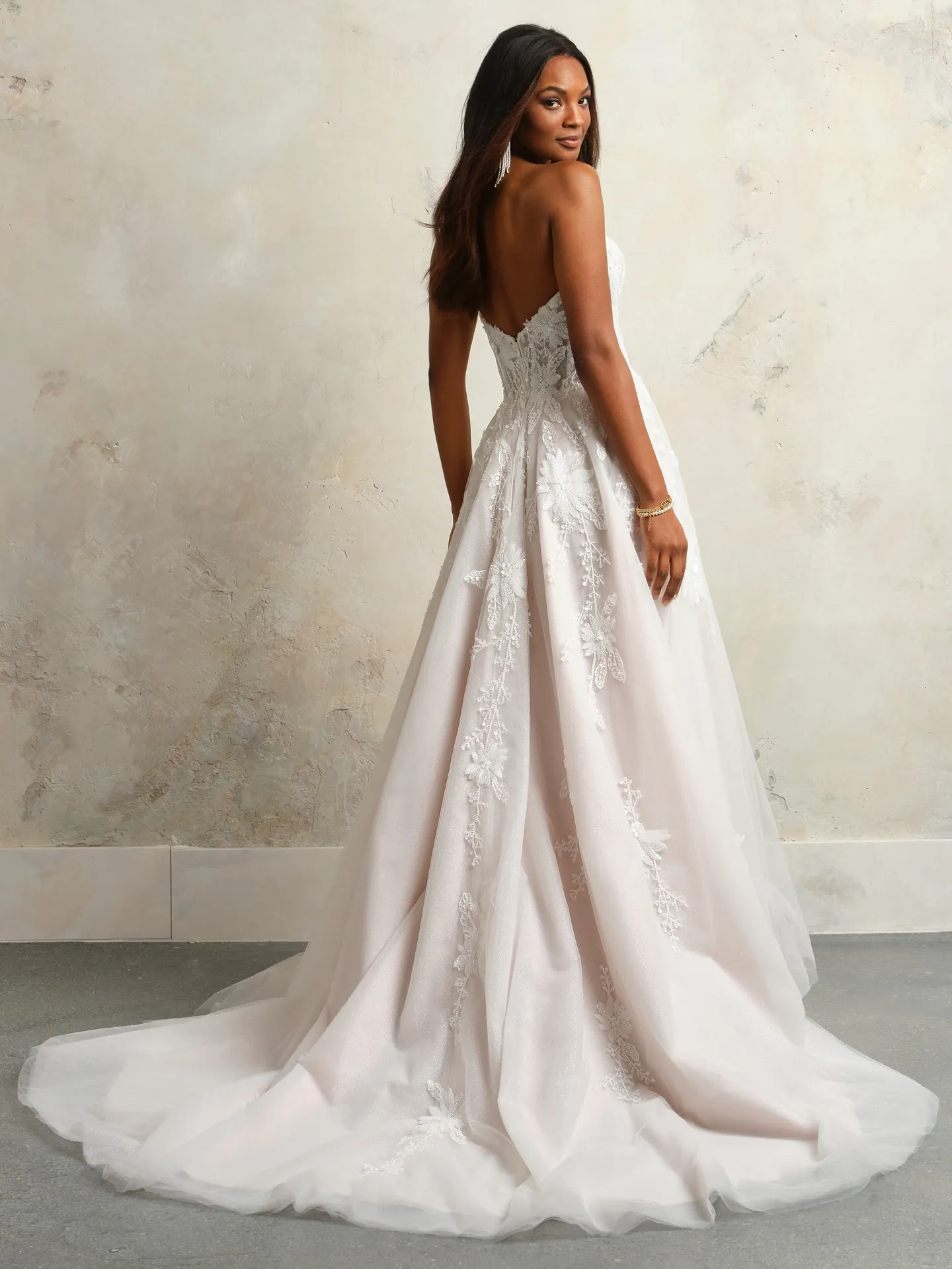 Maggie Sottero Caroline back view bridal gown with sequin lace embellishments.