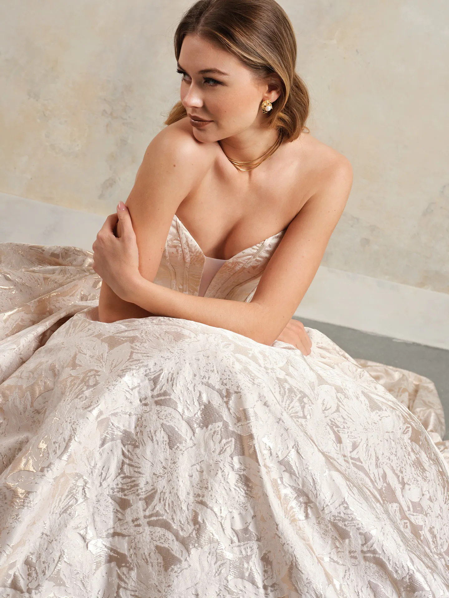 Colorful Derrick Marie floral ball gown side view.