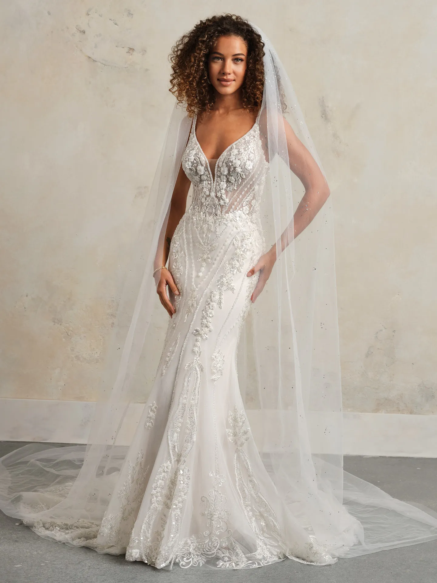 Rebecca Ingram dress front view with rhinestone-accented cathedral veil.