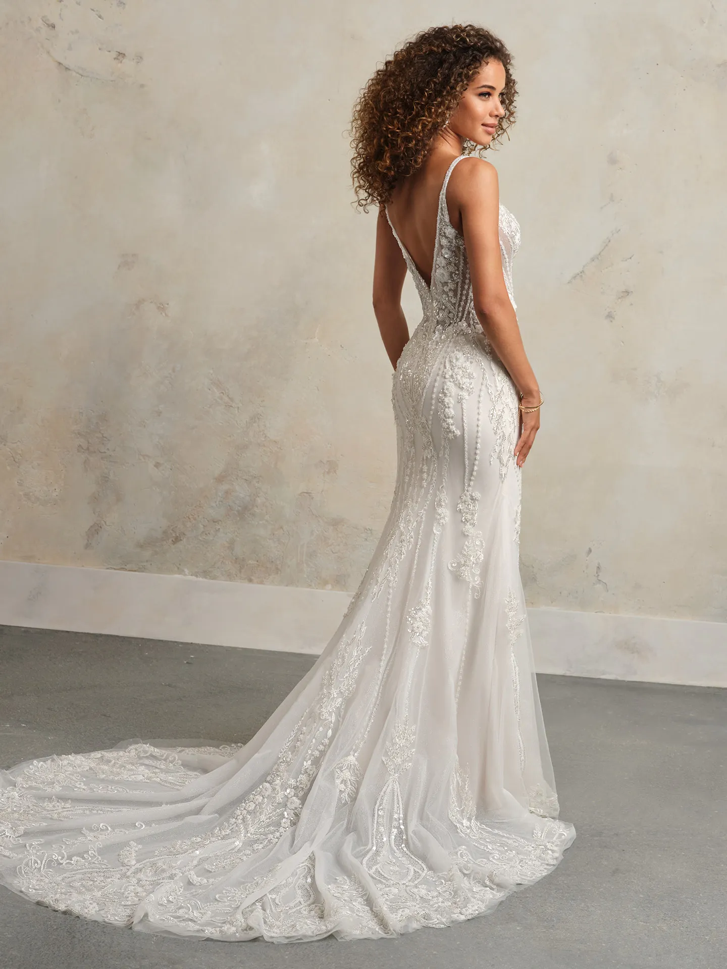 Maggie Sottero Edie glittering deep-V wedding gown back view