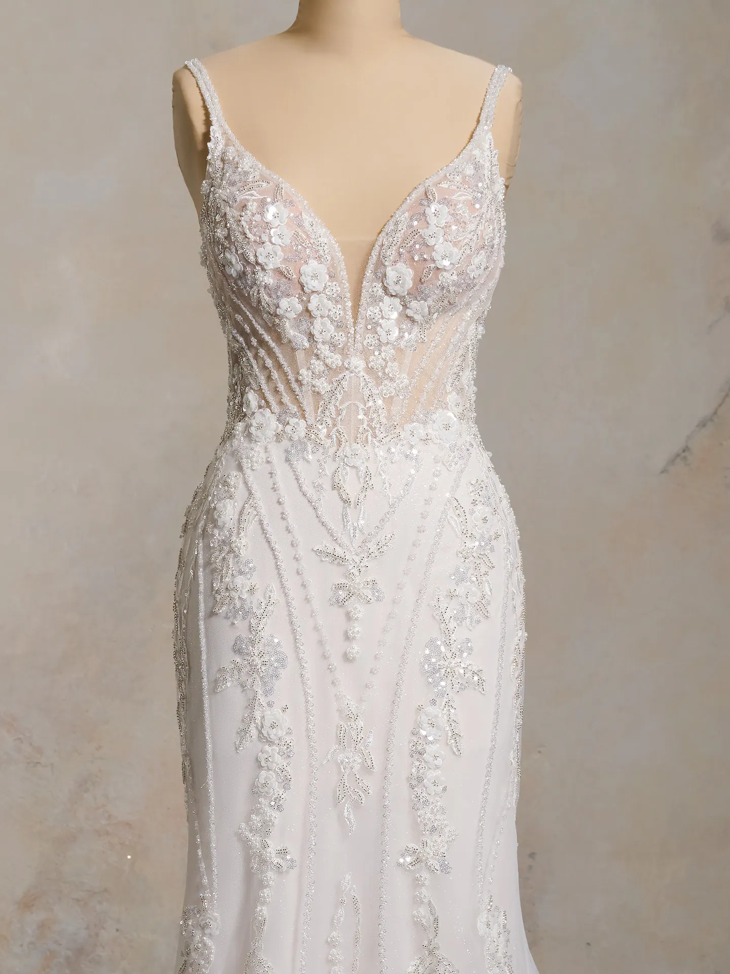 Maggie Sottero Edie front view, glittering deep-V floral lace wedding gown