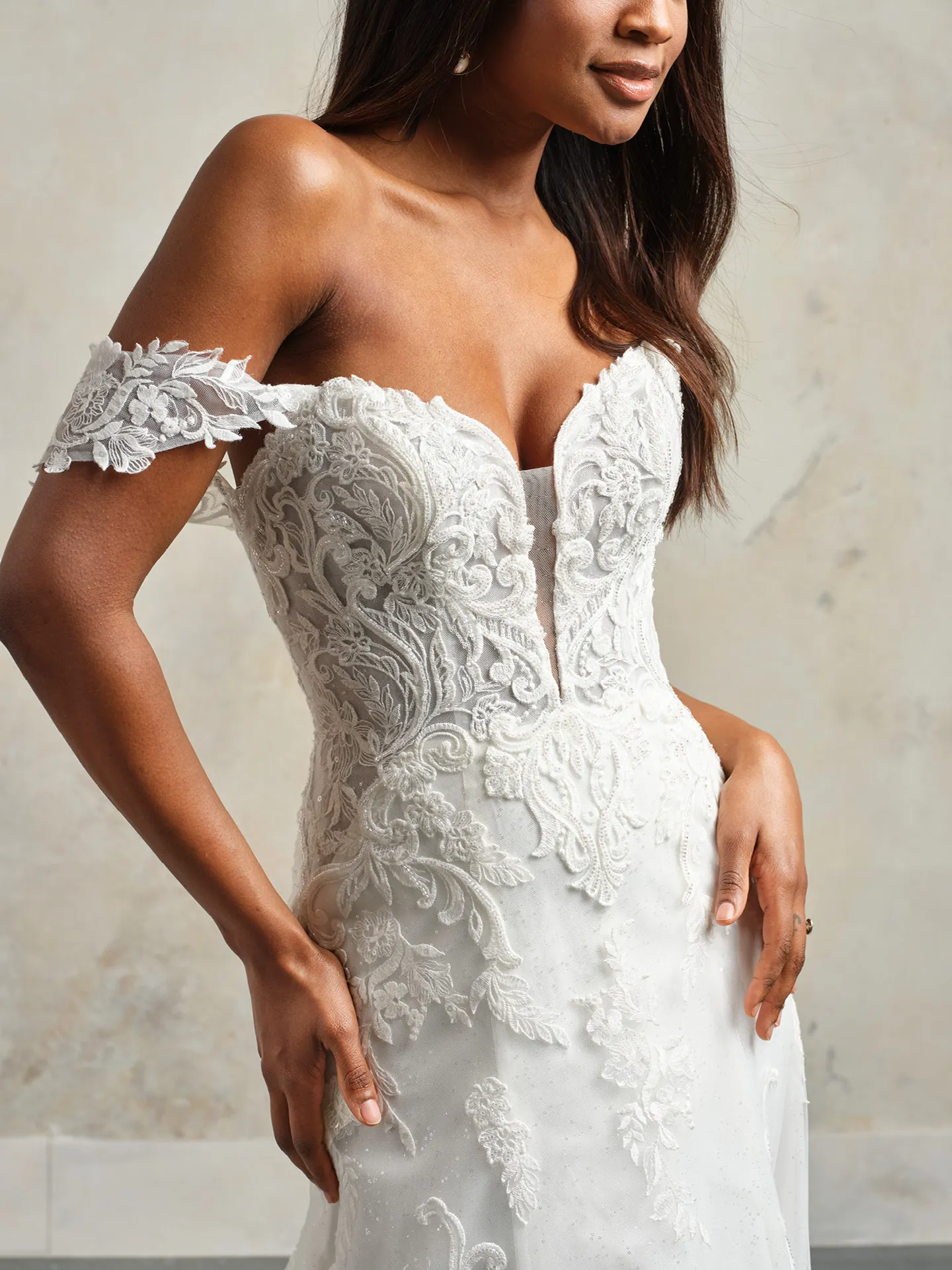 Maggie Sottero Kyler A-Line wedding dress side view with intricate lace detail