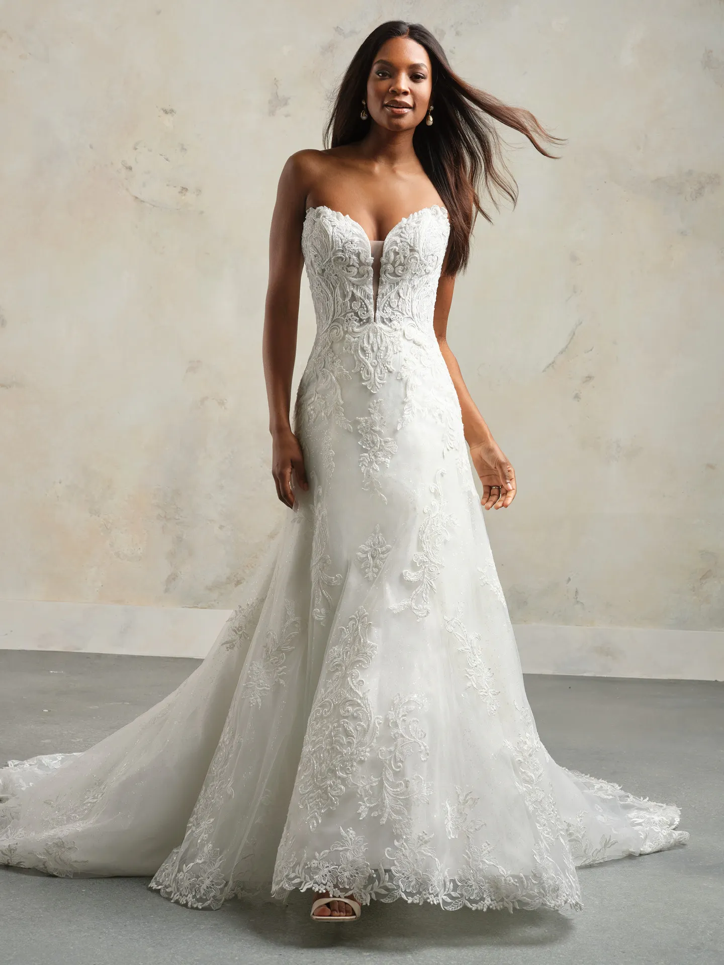 Maggie Sottero Lavish Kyler front view A-Line wedding dress with glittering lace detail