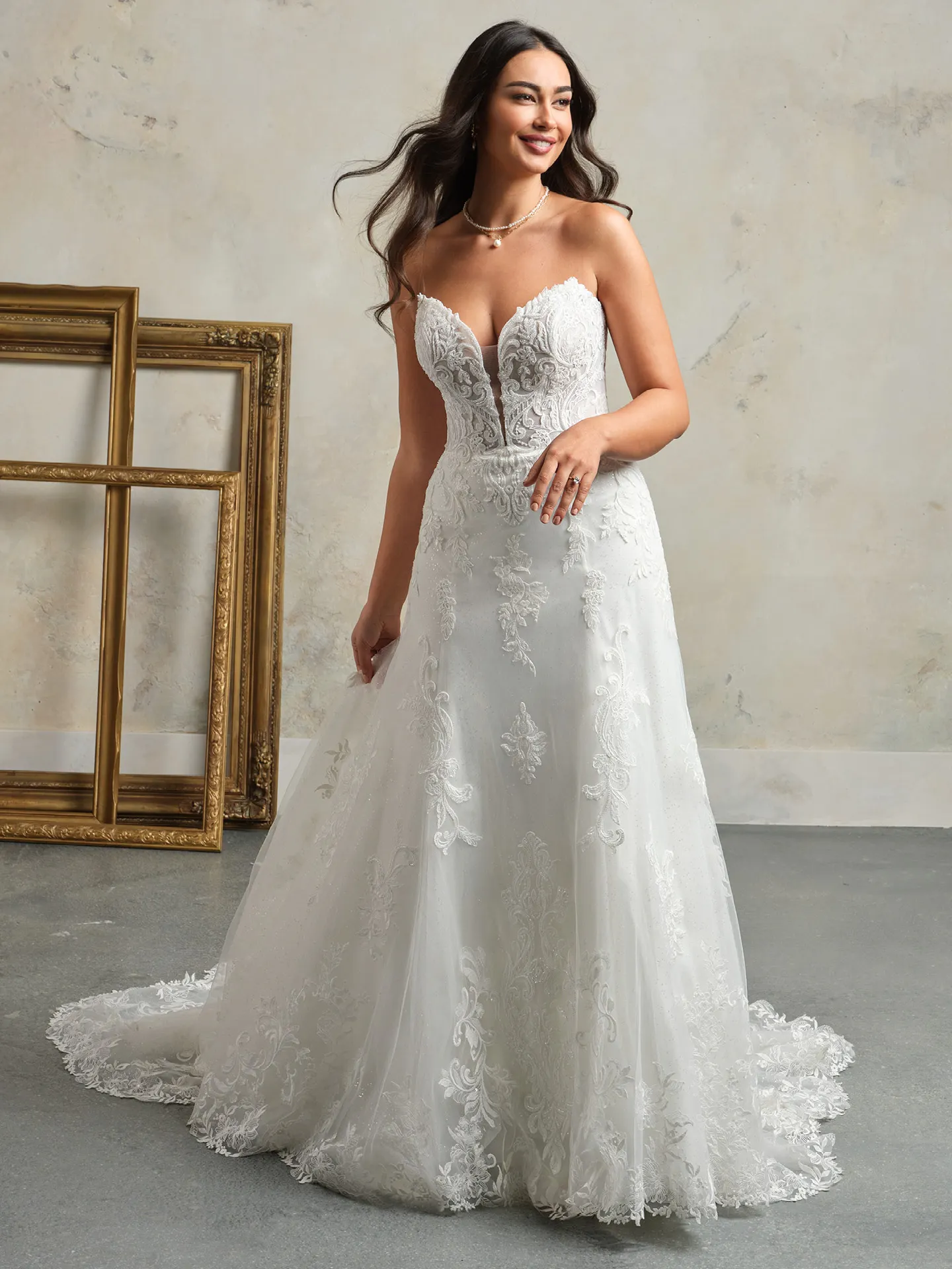 Maggie Sottero Kyler A-Line wedding dress front view with lace details.