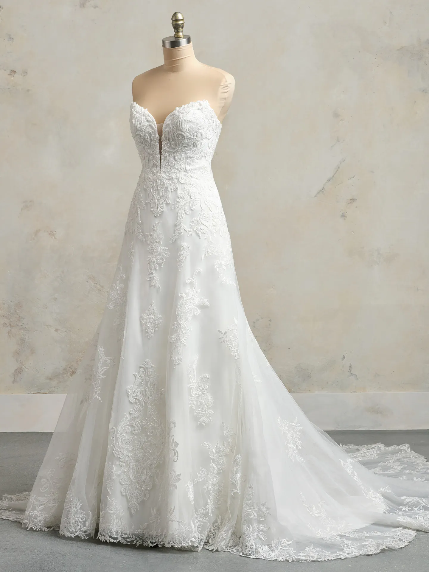 Maggie Sottero Kyler front view A-Line wedding dress on mannequin