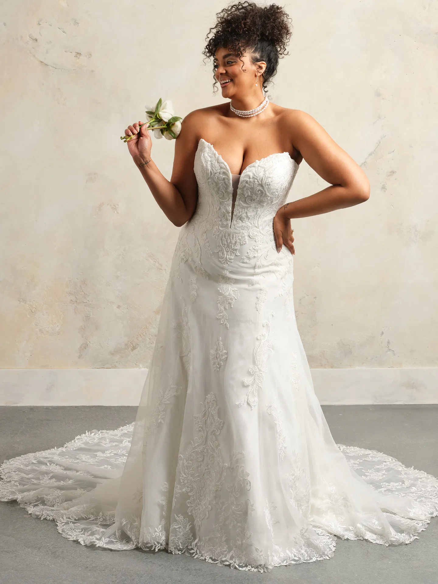 Maggie Sottero Lavish Kyler A-Line front view, with glittering lace and sweetheart neckline