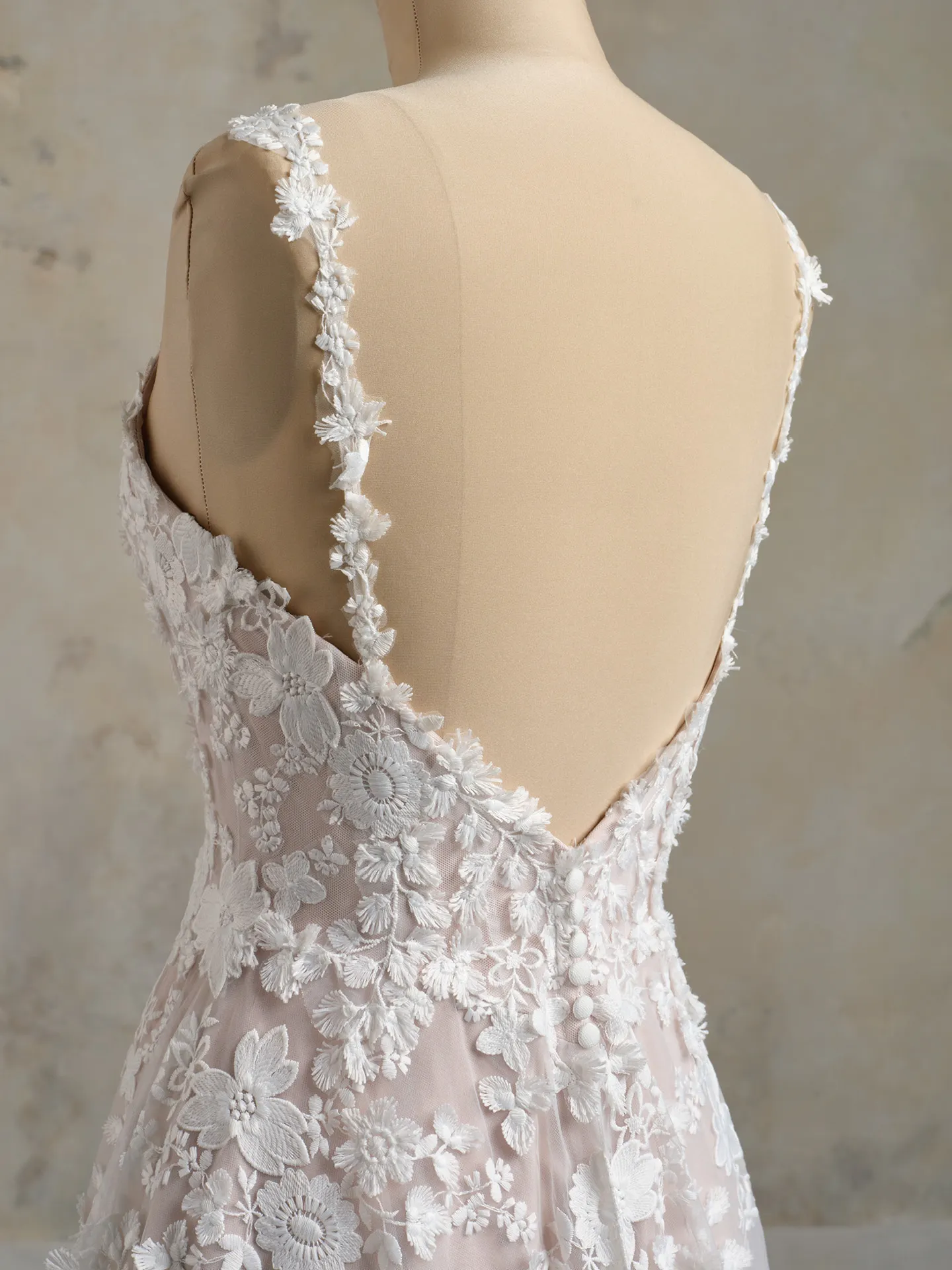 Maggie Sottero Ladonna back view, 3D floral details, romantic style wedding dress