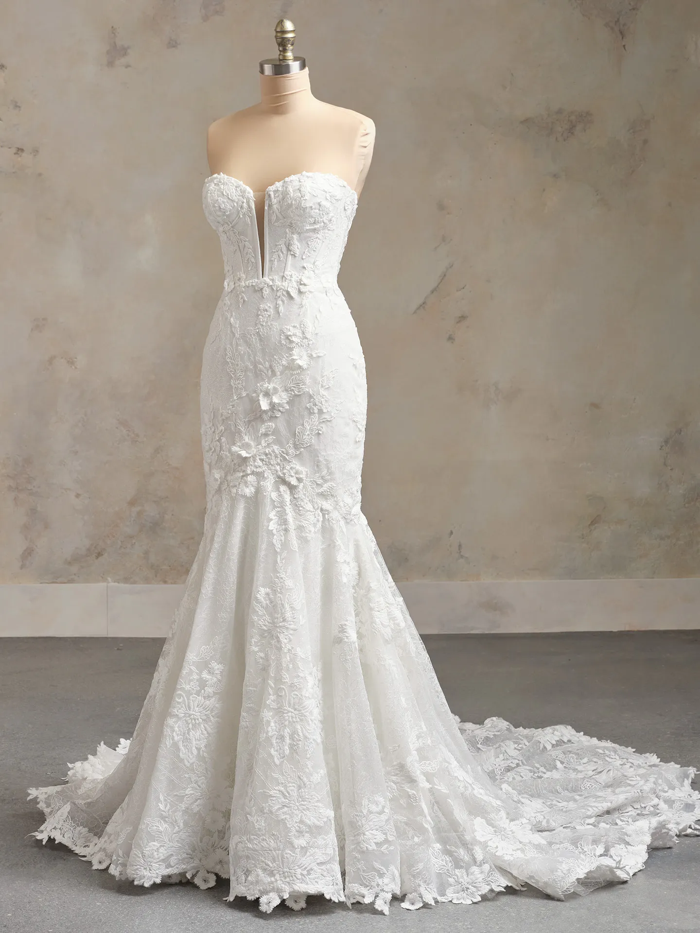 Maggie Sottero Ortensia front view lace bridal dress on mannequin.