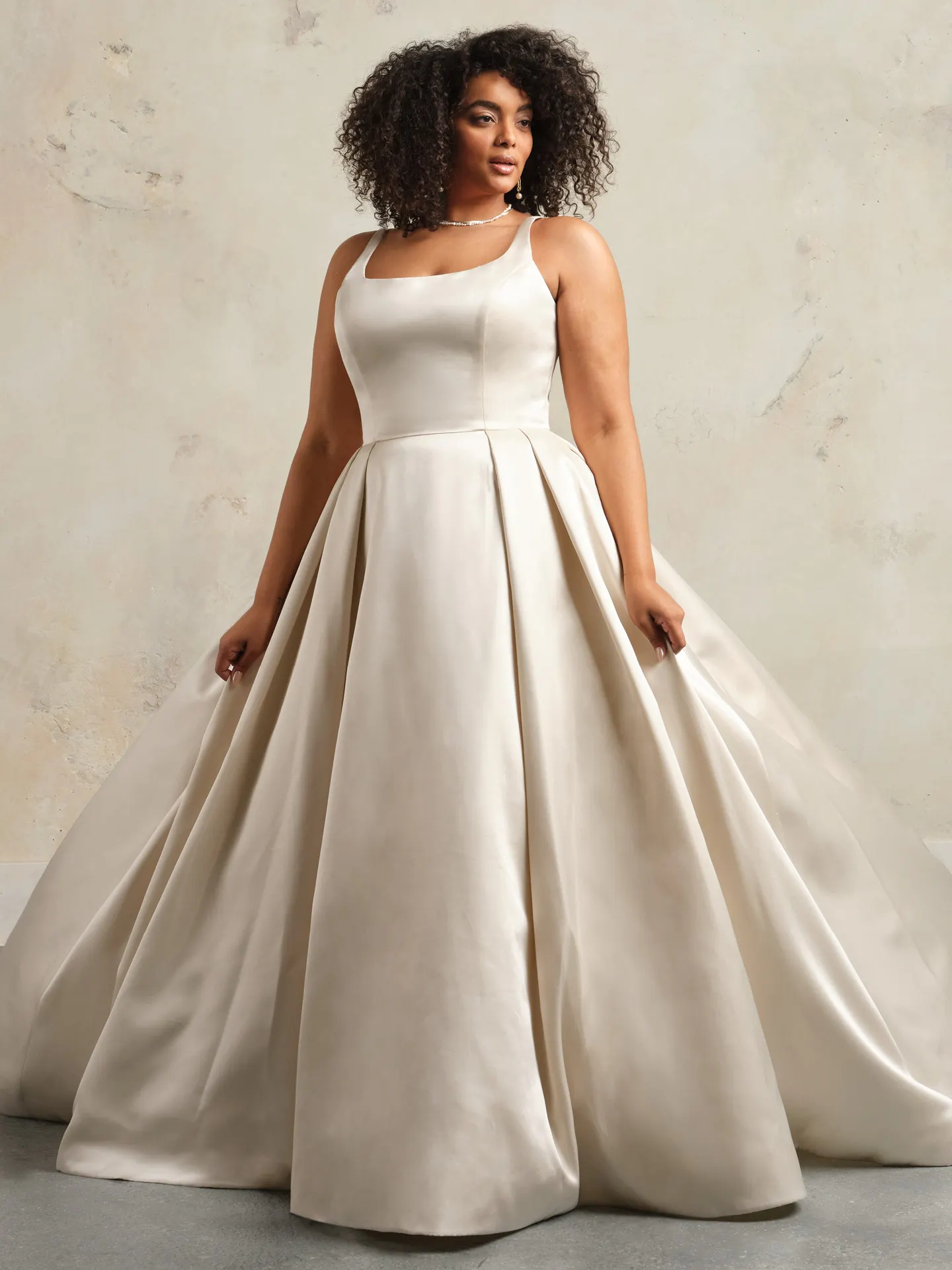 Rebecca Ingram Selena front view satin ballgown with pockets