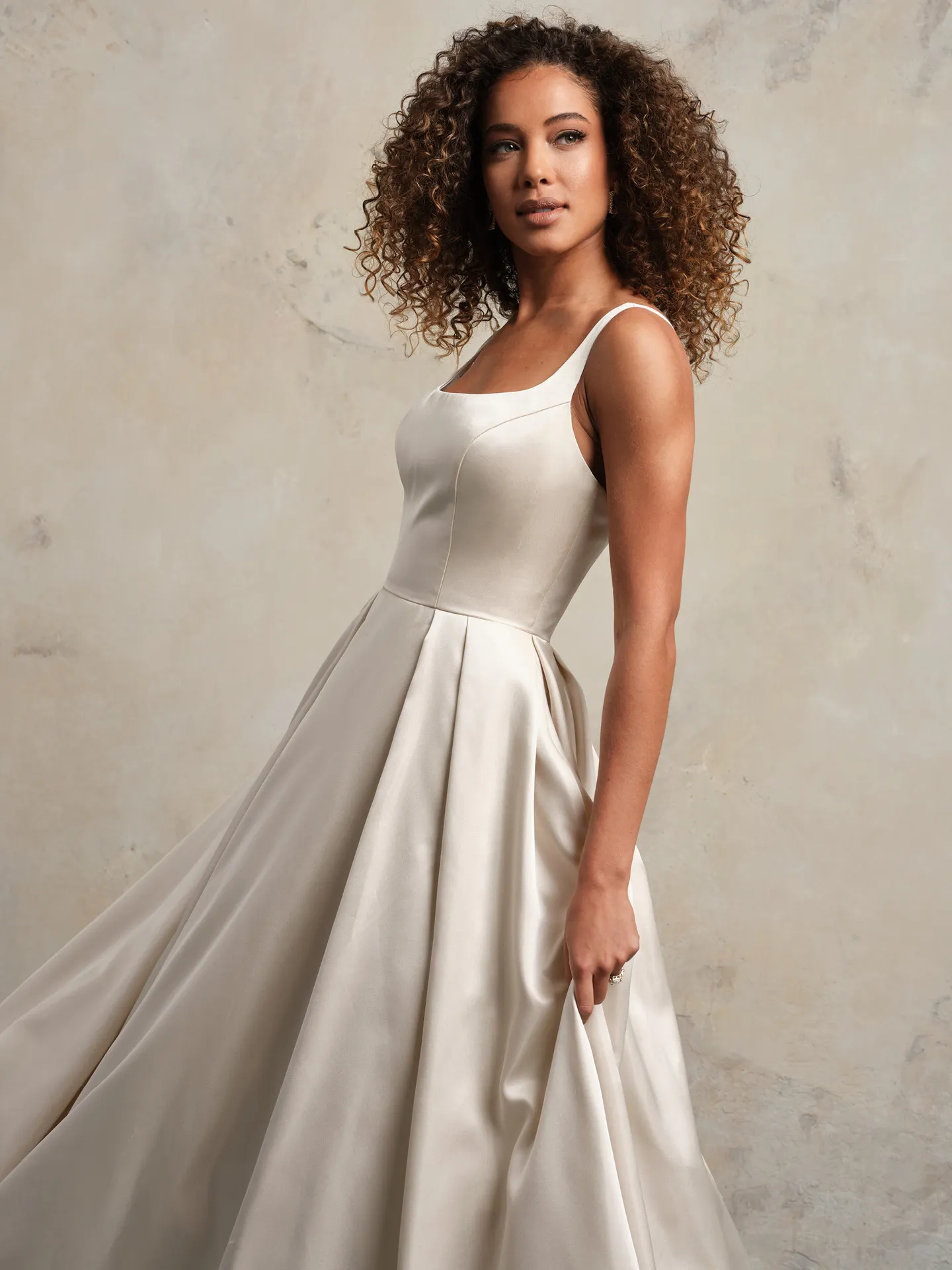 Rebecca Ingram Selena side view satin gown with pockets