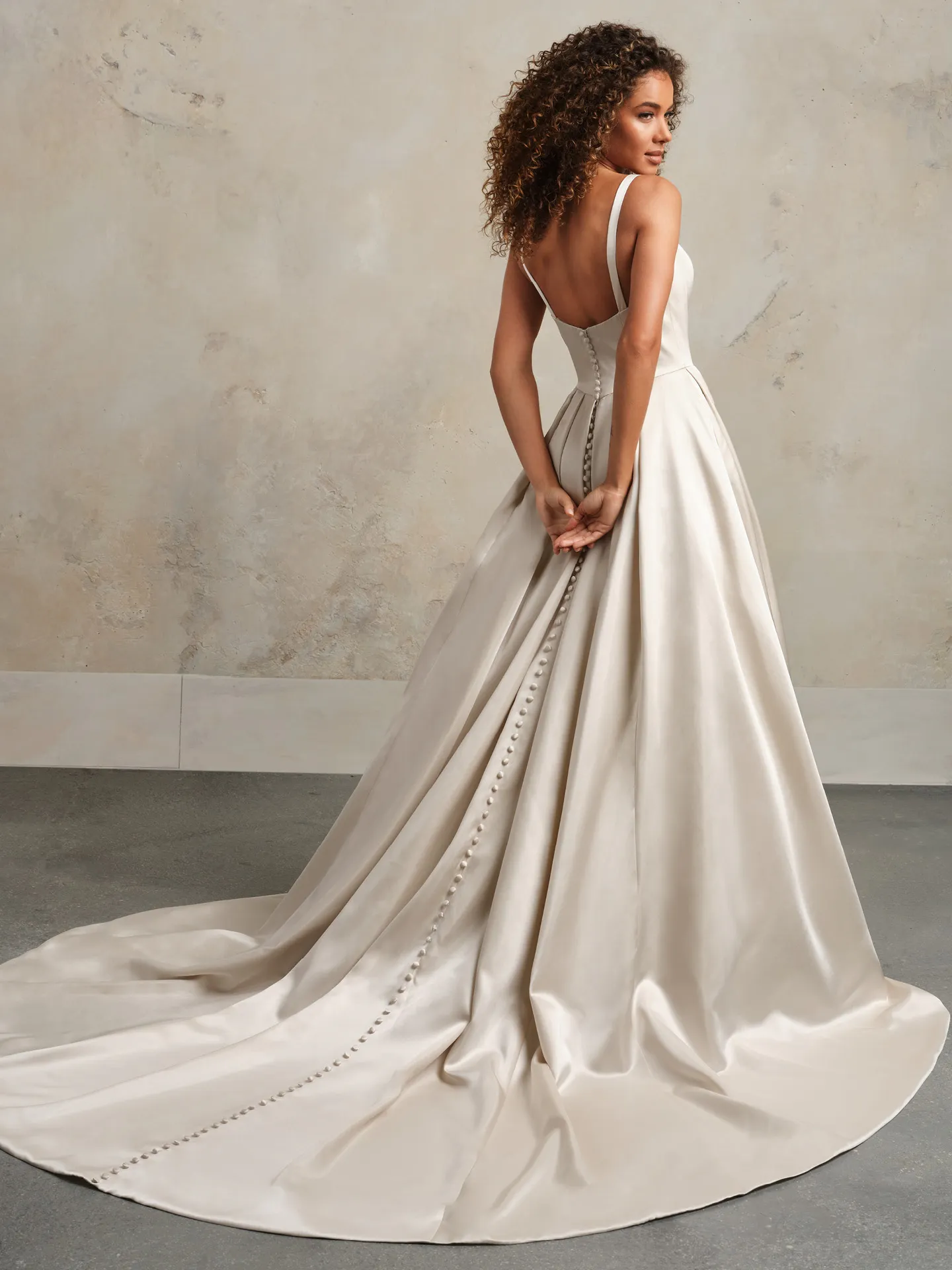 Rebecca Ingram Selena back view satin gown with buttons