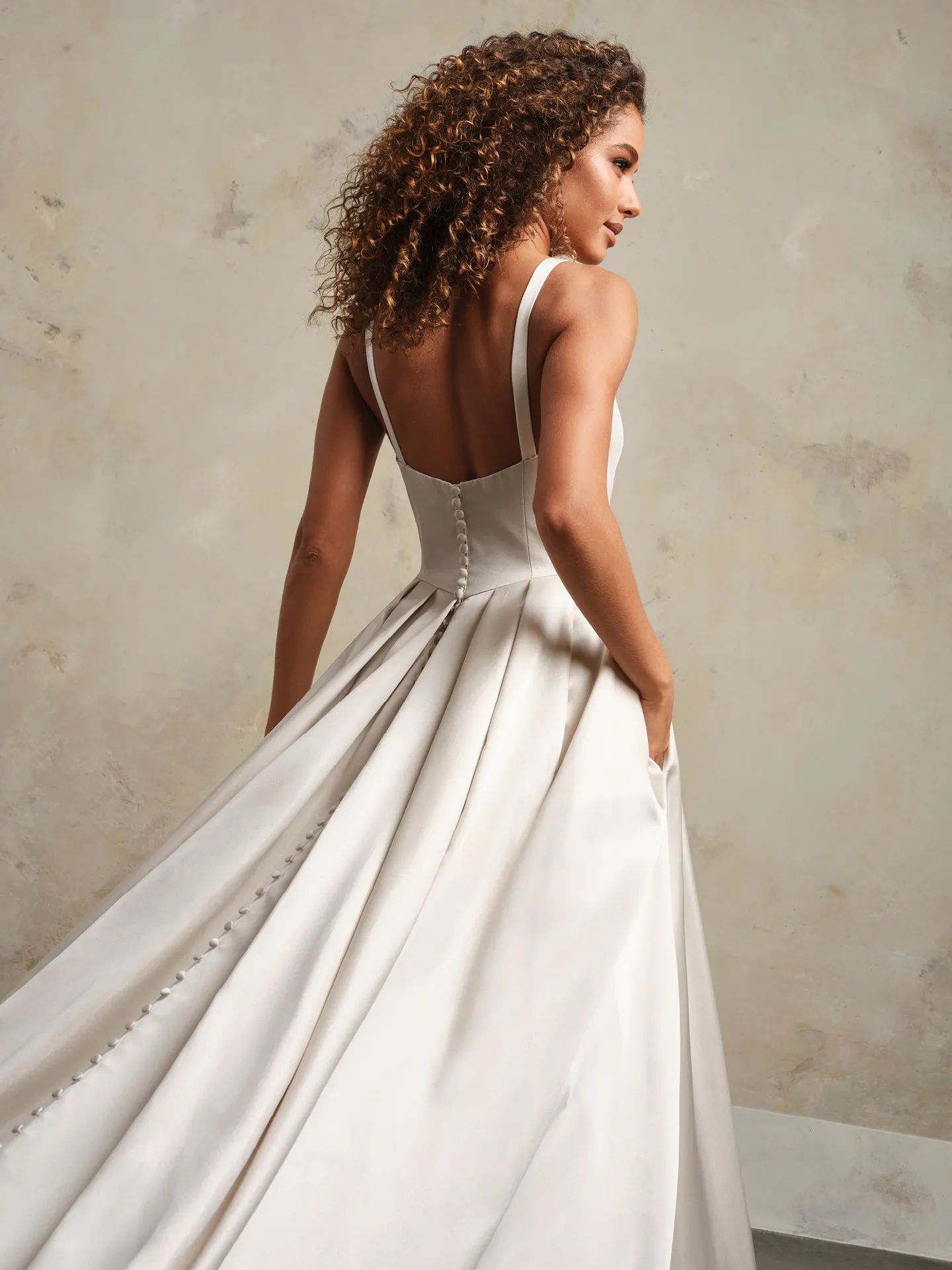 Rebecca Ingram Selena back view satin gown with pockets