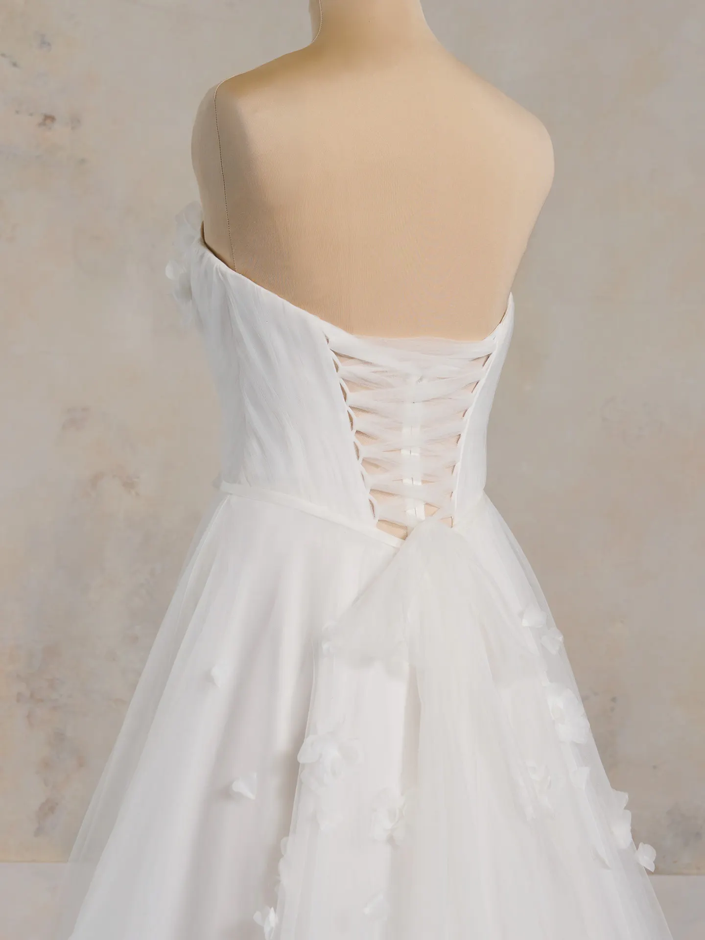 Maggie Sottero Allison back view A-Line tulle gown with floral details