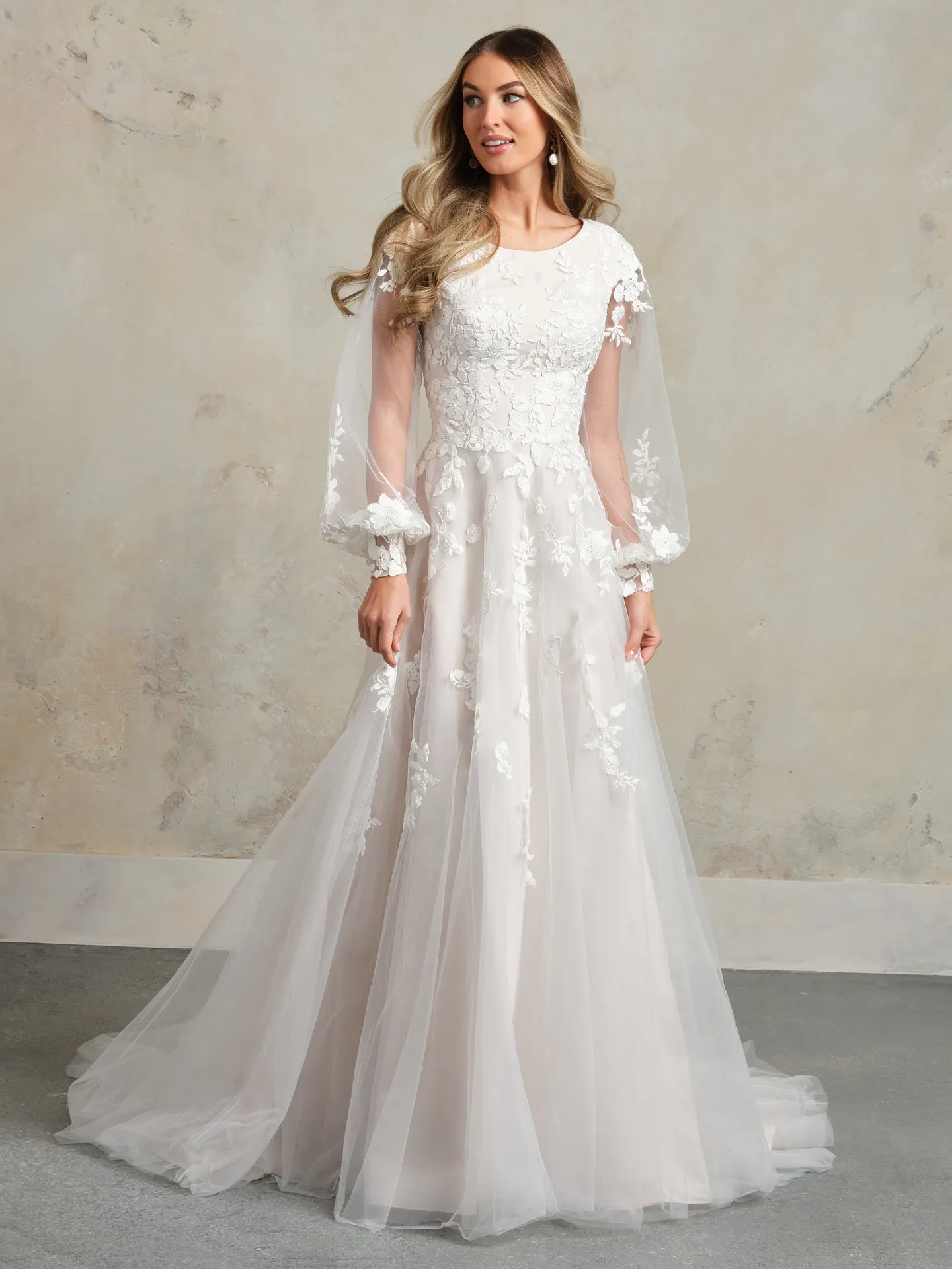 Rebecca Ingram Benicia front view floral lace modest bridal gown