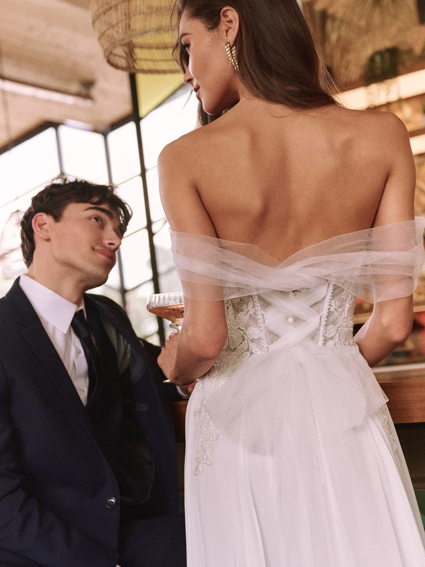 Maggie Sottero Blake back view flowy tulle corset wedding dress with pearls