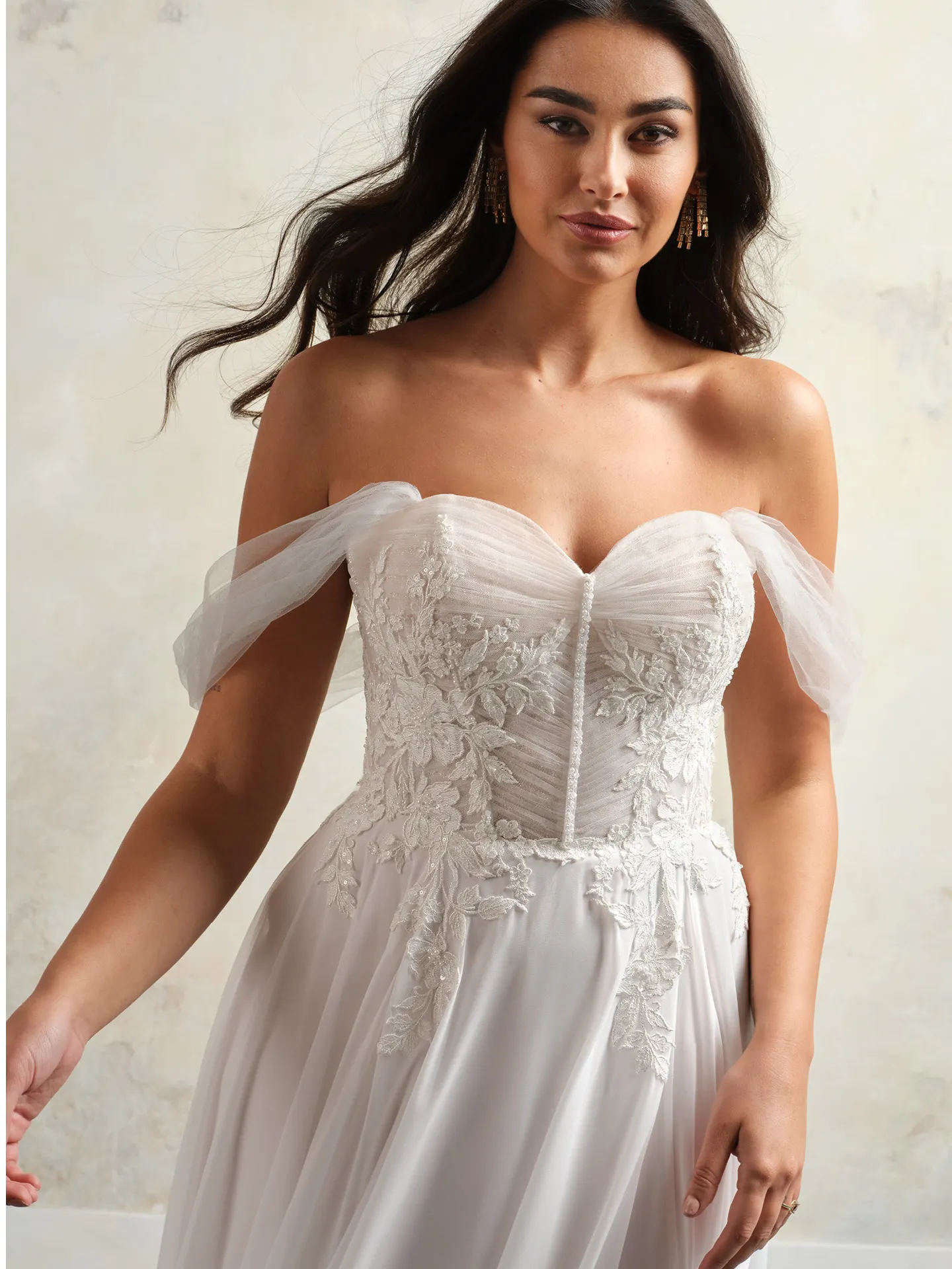 Maggie Sottero Blake wedding dress front view with lace and flowy tulle corset.