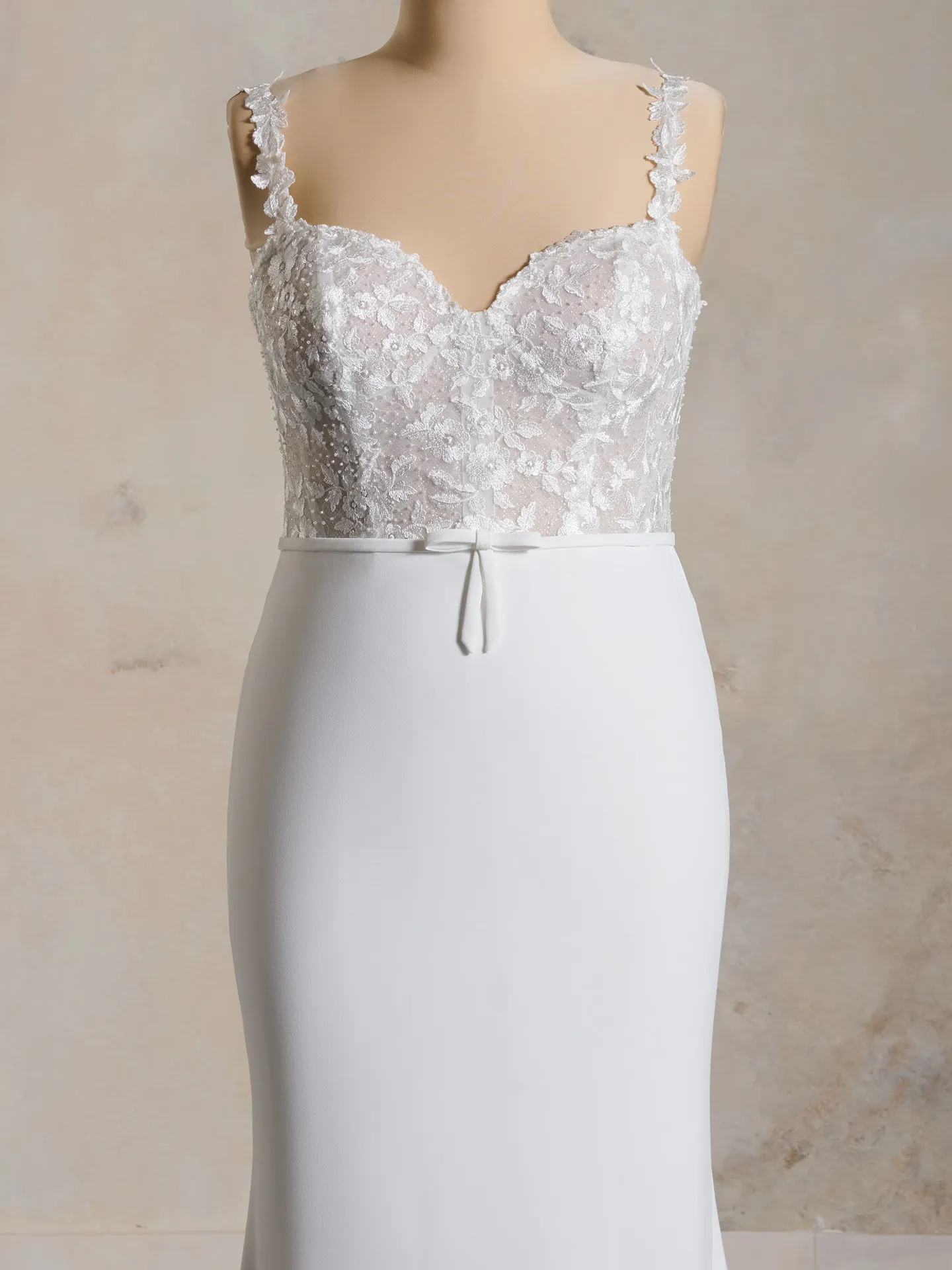 Rebecca Ingram Cecilia front view lace bodice with miniature bow