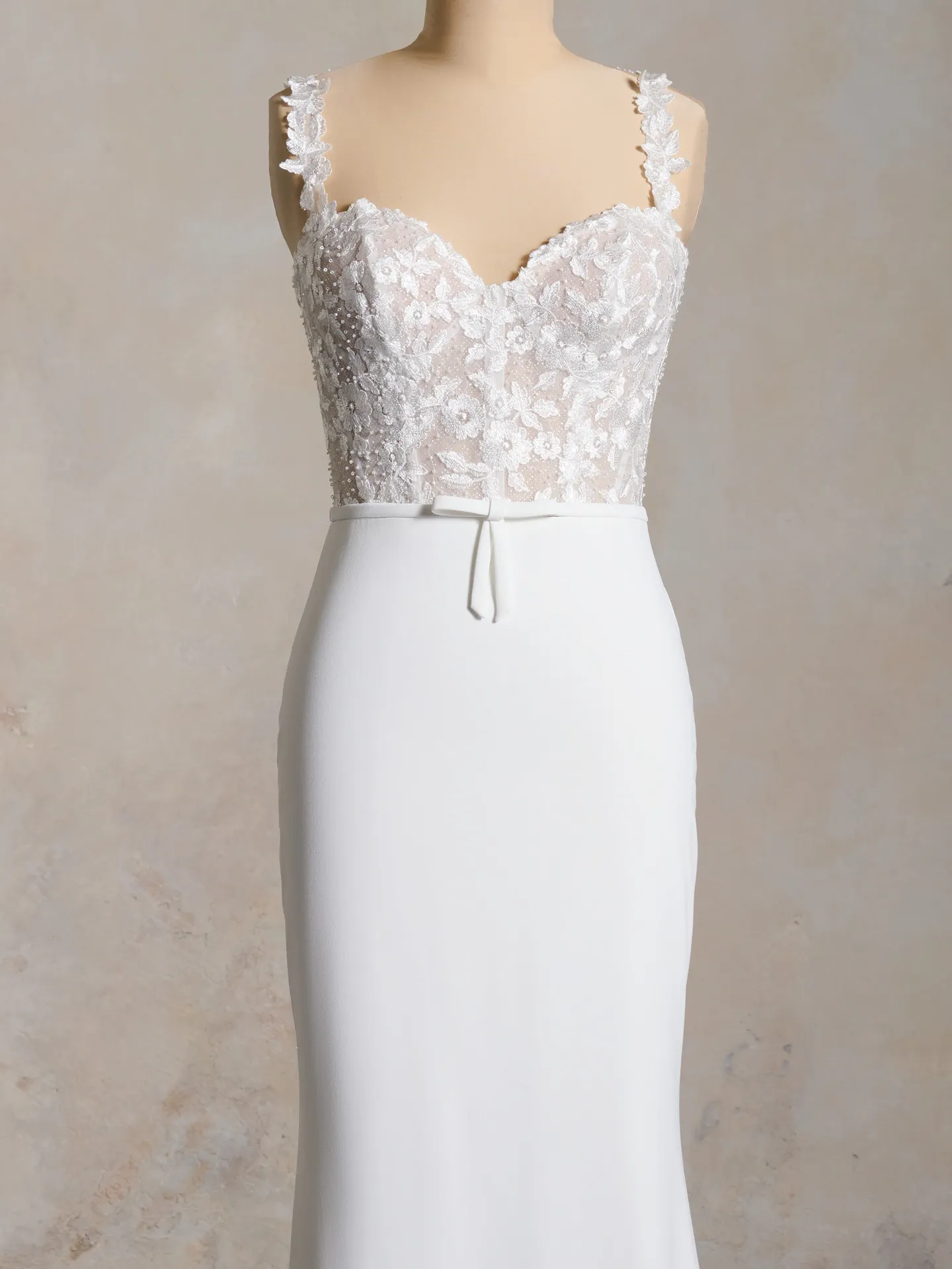 Cecilia gown front view, lace bodice, bow detail, sheath style.