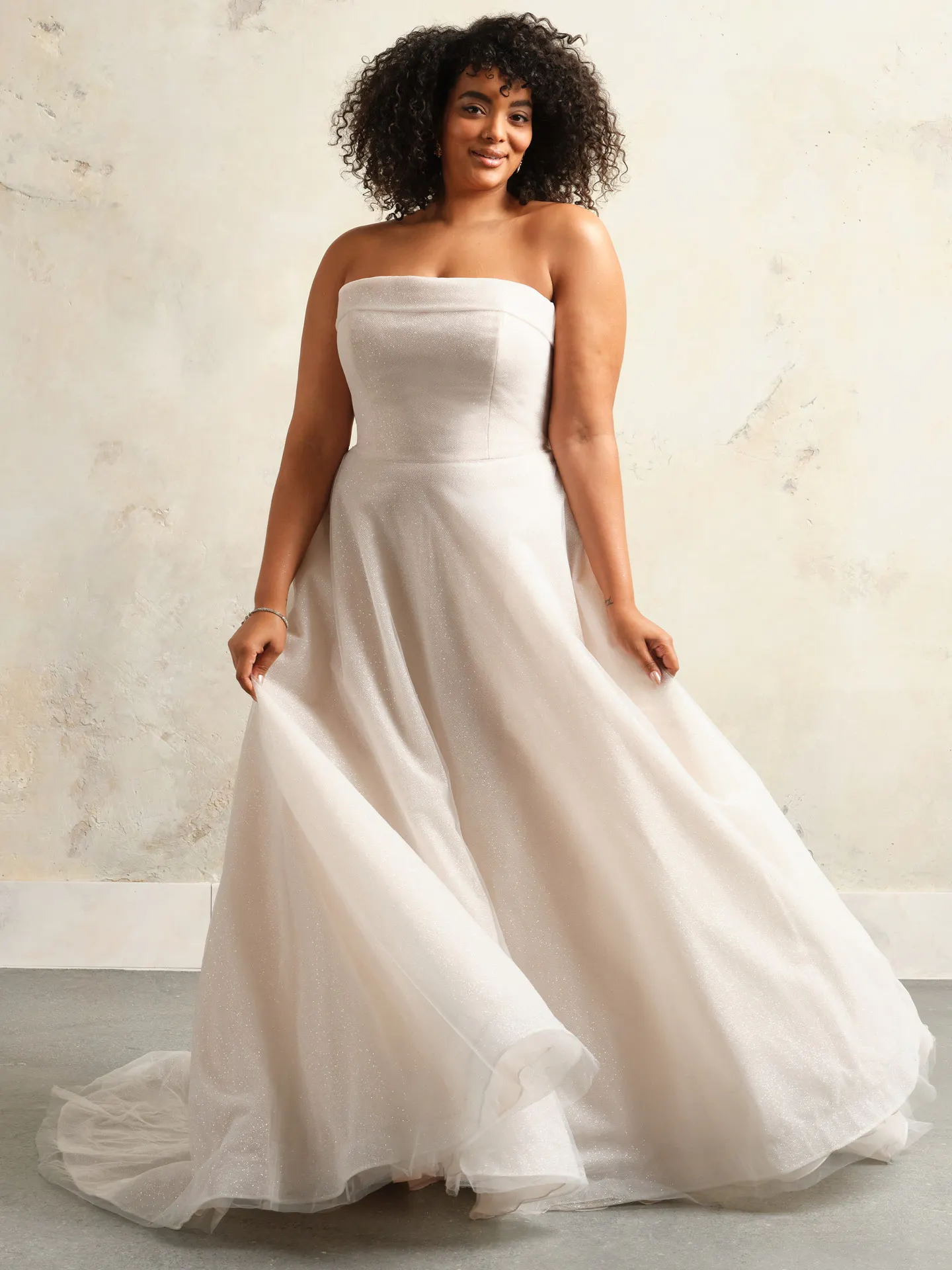 Maggie Sottero Elizabeth front view, soft A-Line dress with banded cuff.