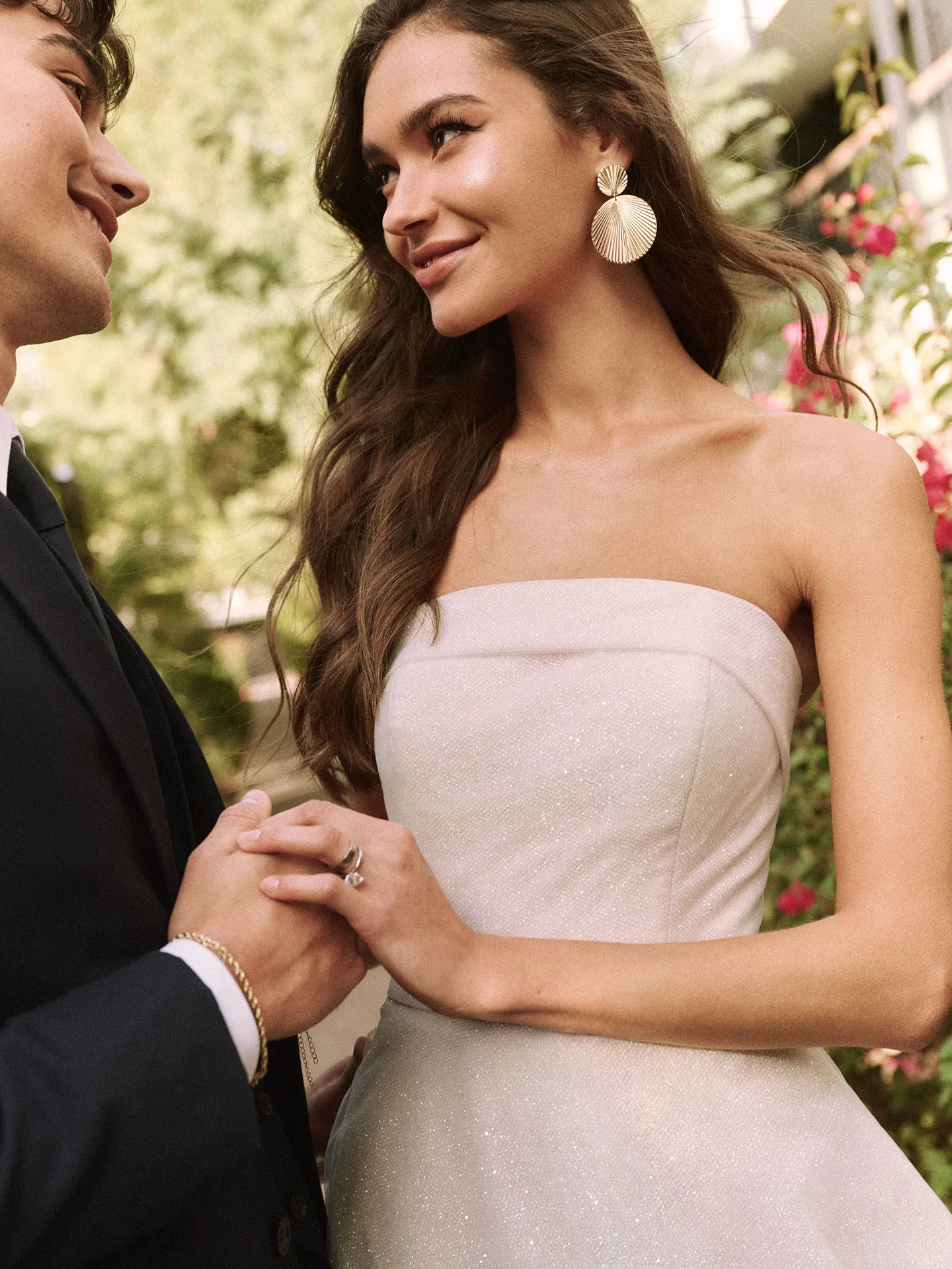 Soft A-Line strapless bridal dress outdoors.