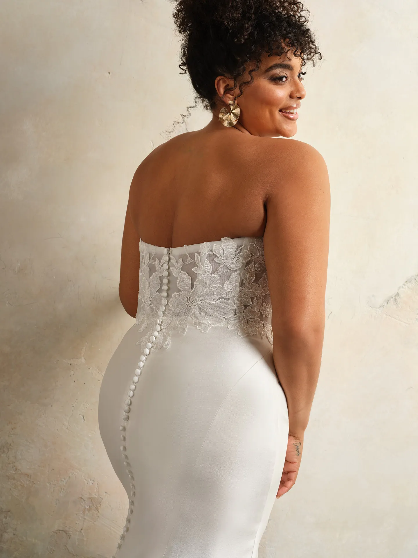 Maggie Sottero Floral Goldie back view, strapless corset gown with floral lace details