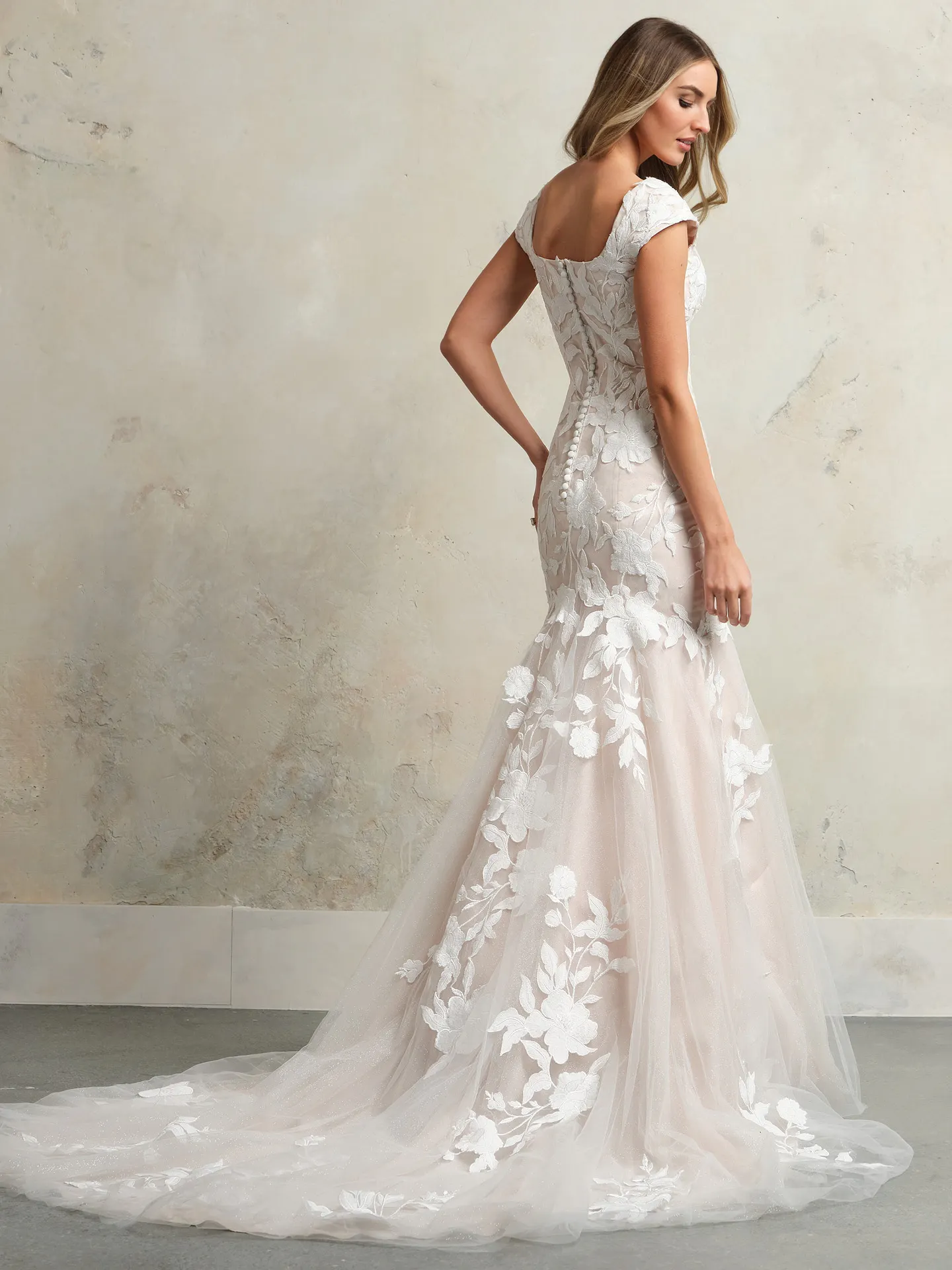 Hattie Leigh side view, floral lace wedding gown by Maggie Sottero