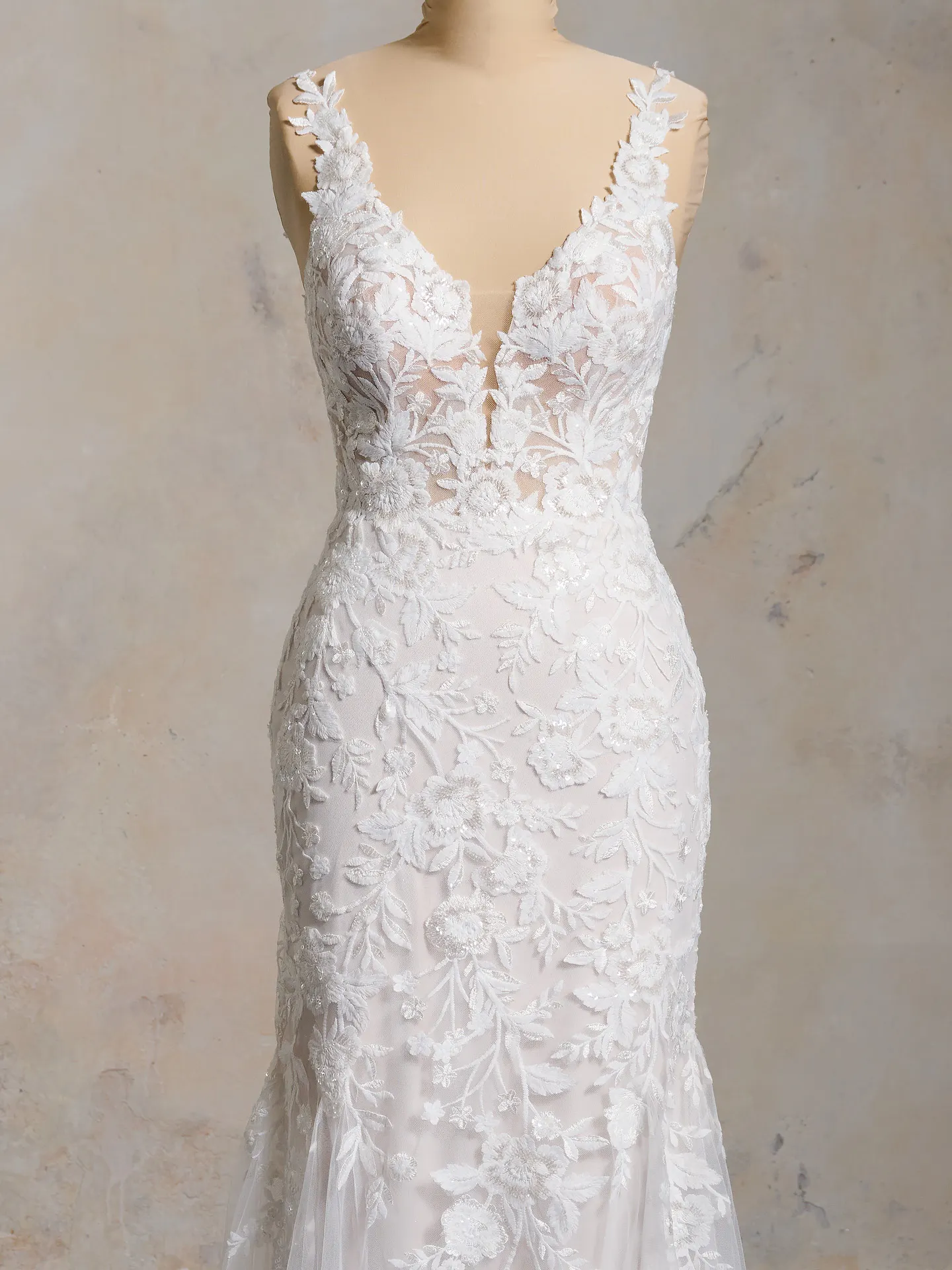 Maggie Sottero Mandy front view sparkly fit-and-flare bridal dress with floral lace design